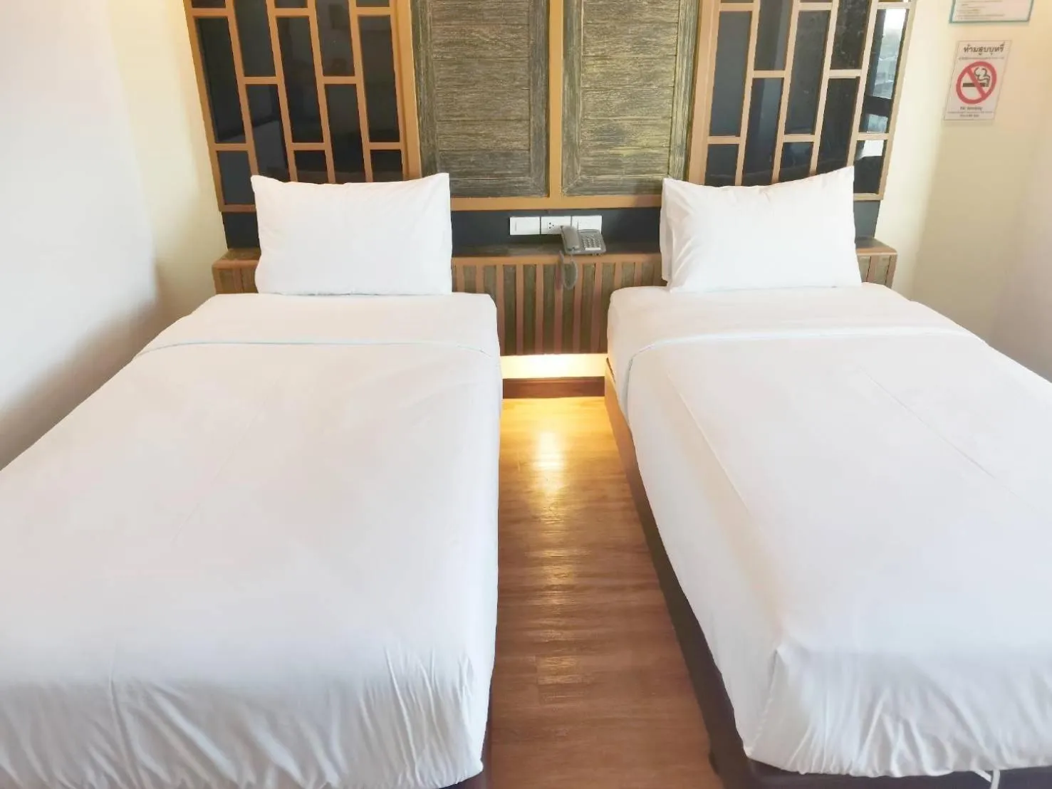 Bed in PS Thungsao Hotel