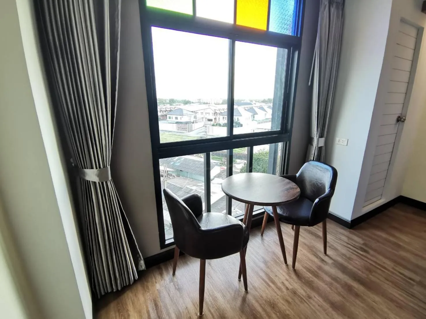 Seating area in PS Thungsao Hotel