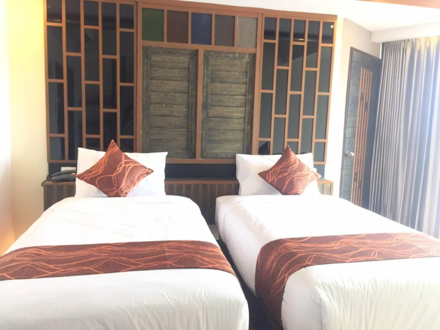 Bed in PS Thungsao Hotel