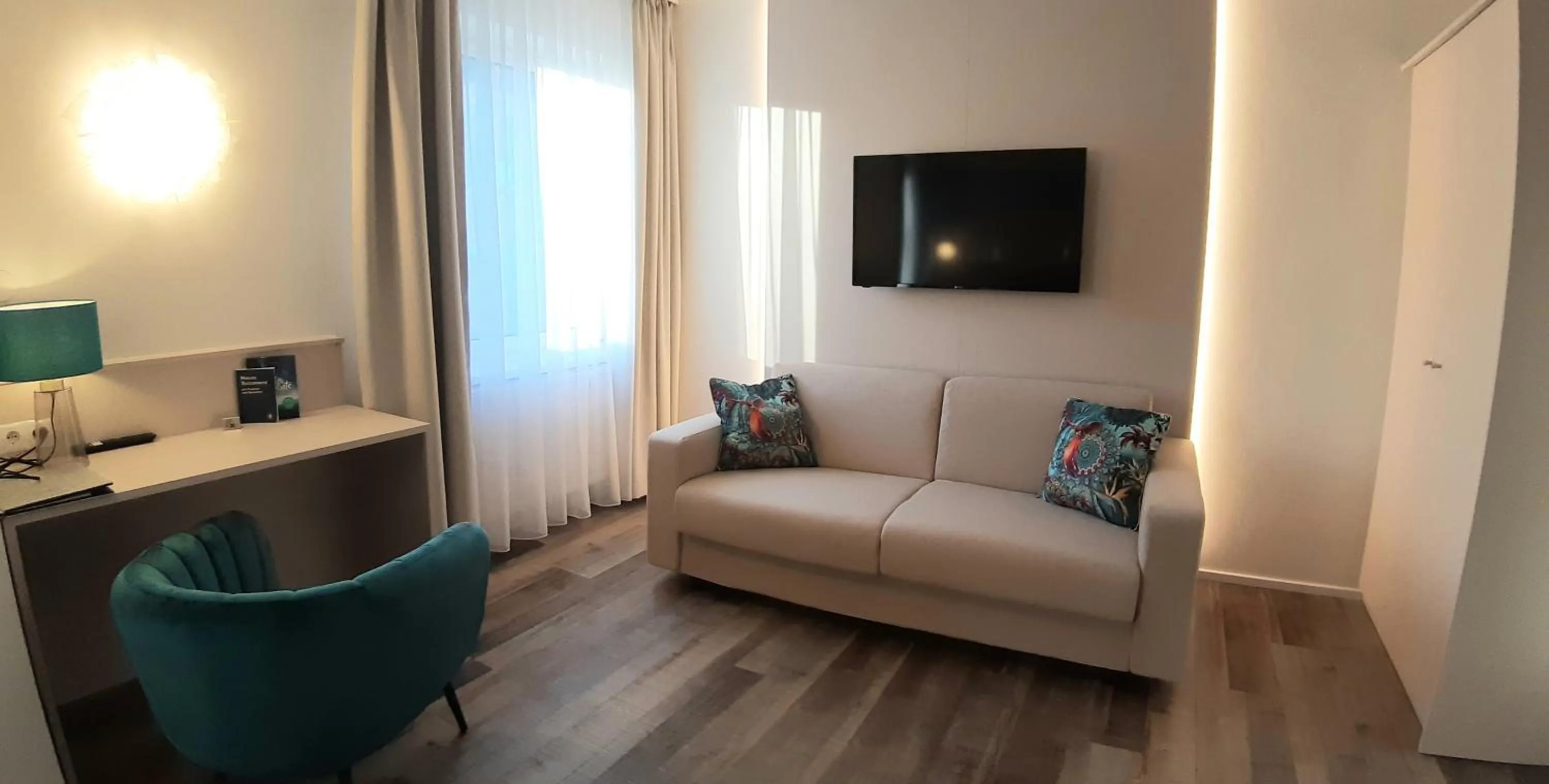 Communal lounge/ TV room in Hotel-Restaurant Gollner