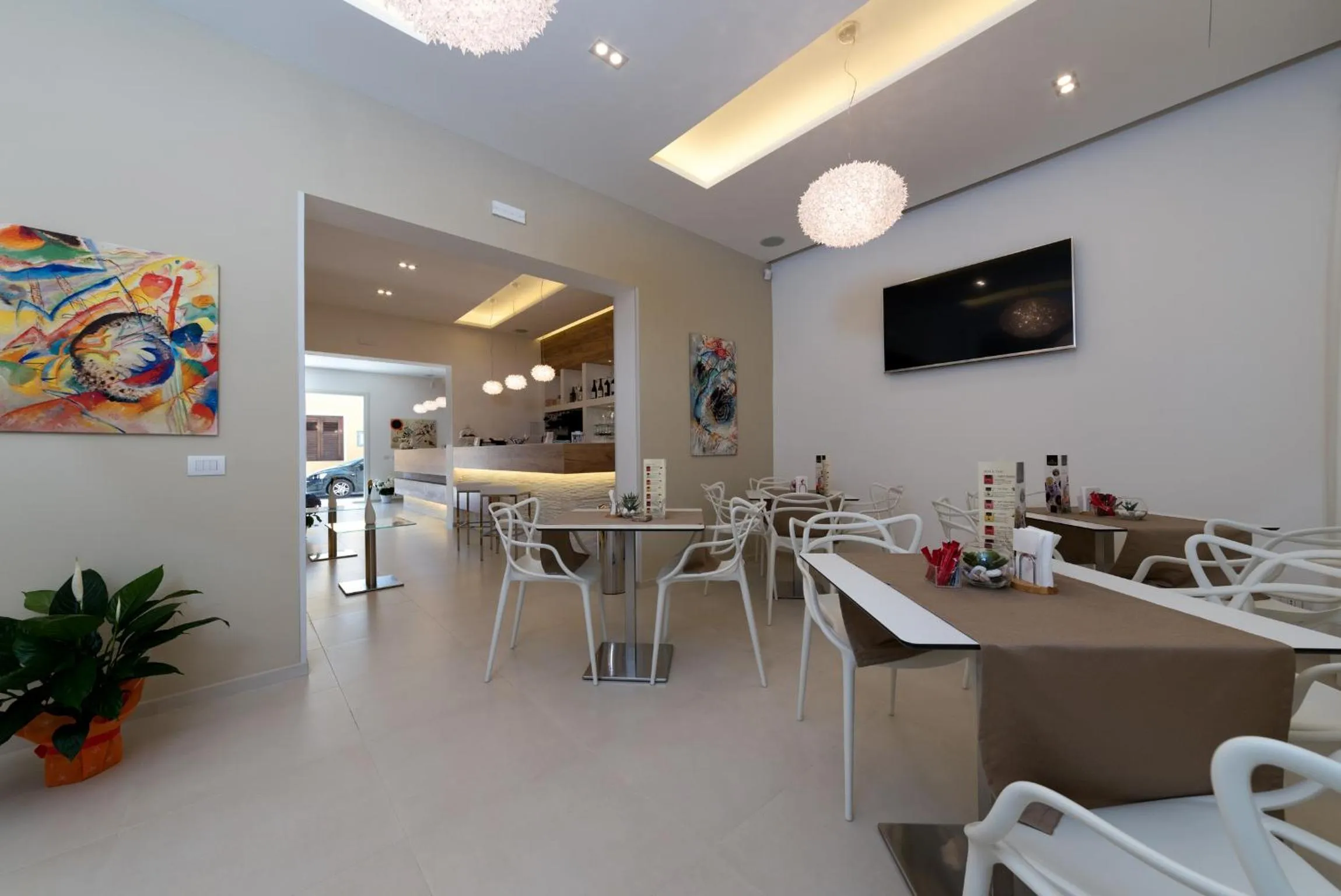 Communal lounge/ TV room in Artemide Hotel