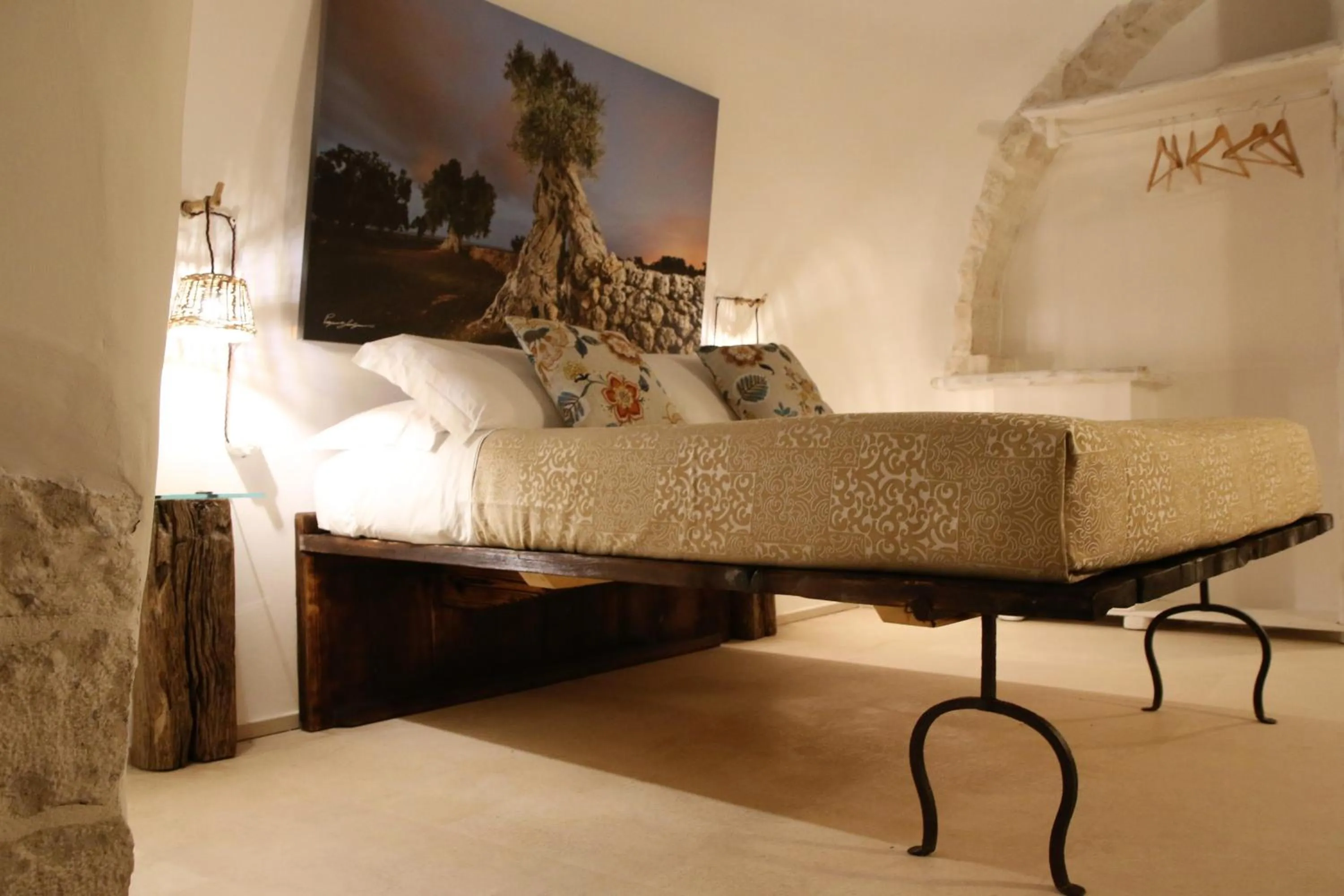 Photo of the whole room, Bed in Trulli Holiday Deluxe & Wellness
