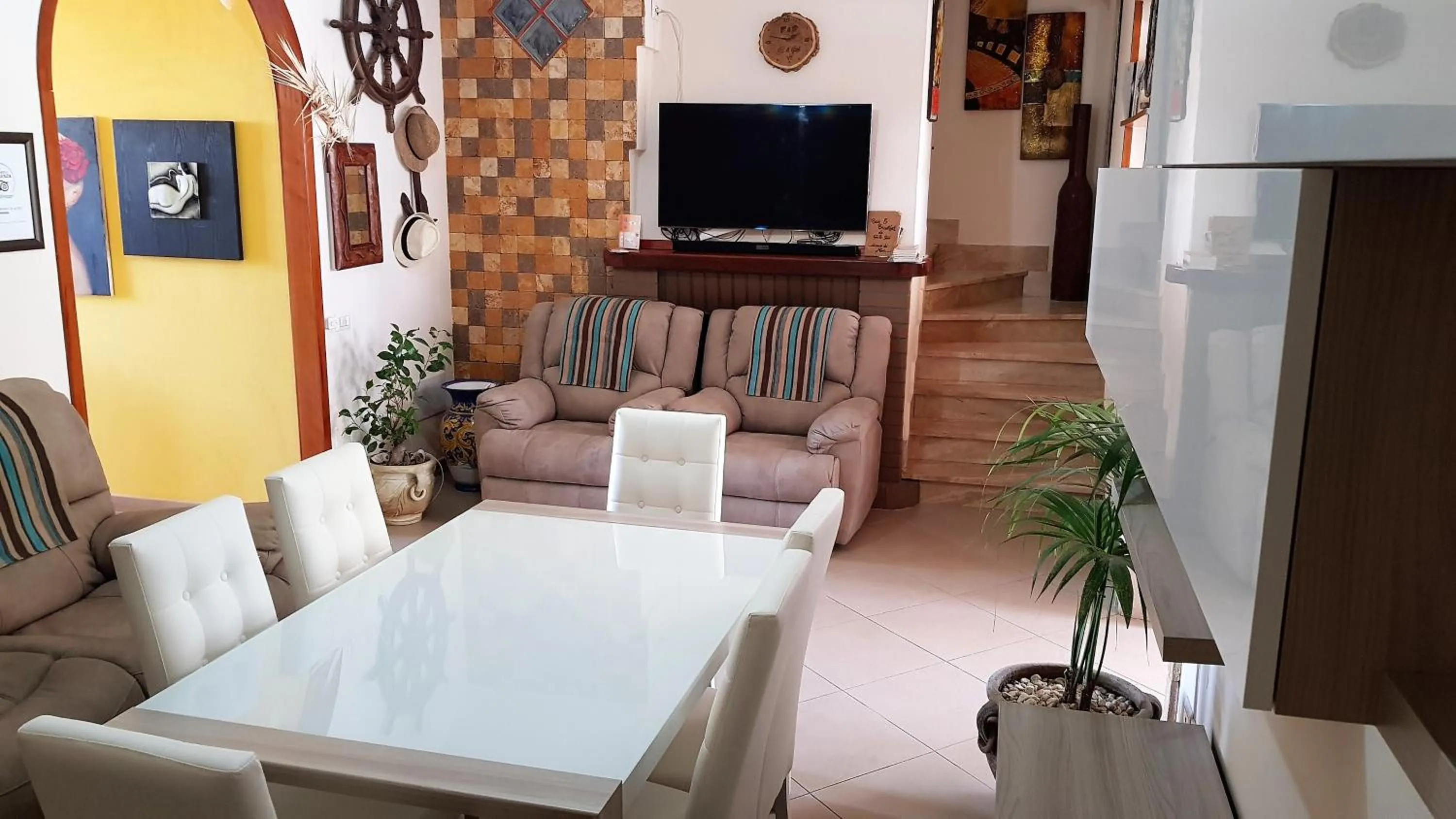 Communal lounge/ TV room in B&B Gi & Giò