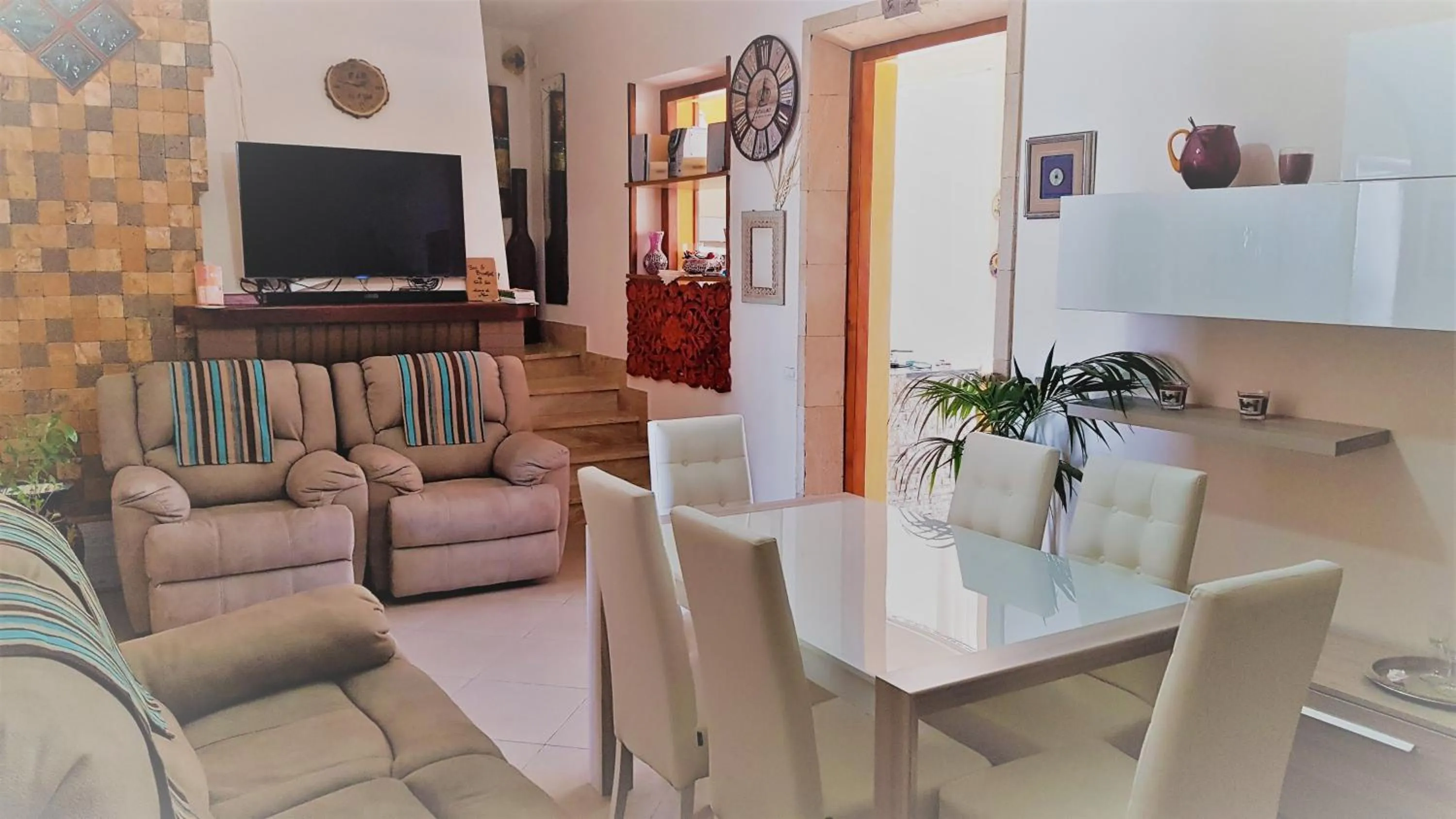 Communal lounge/ TV room in B&B Gi & Giò