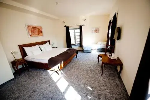 Triple Room in Malom Hotel Triple Room in Malom Hotel