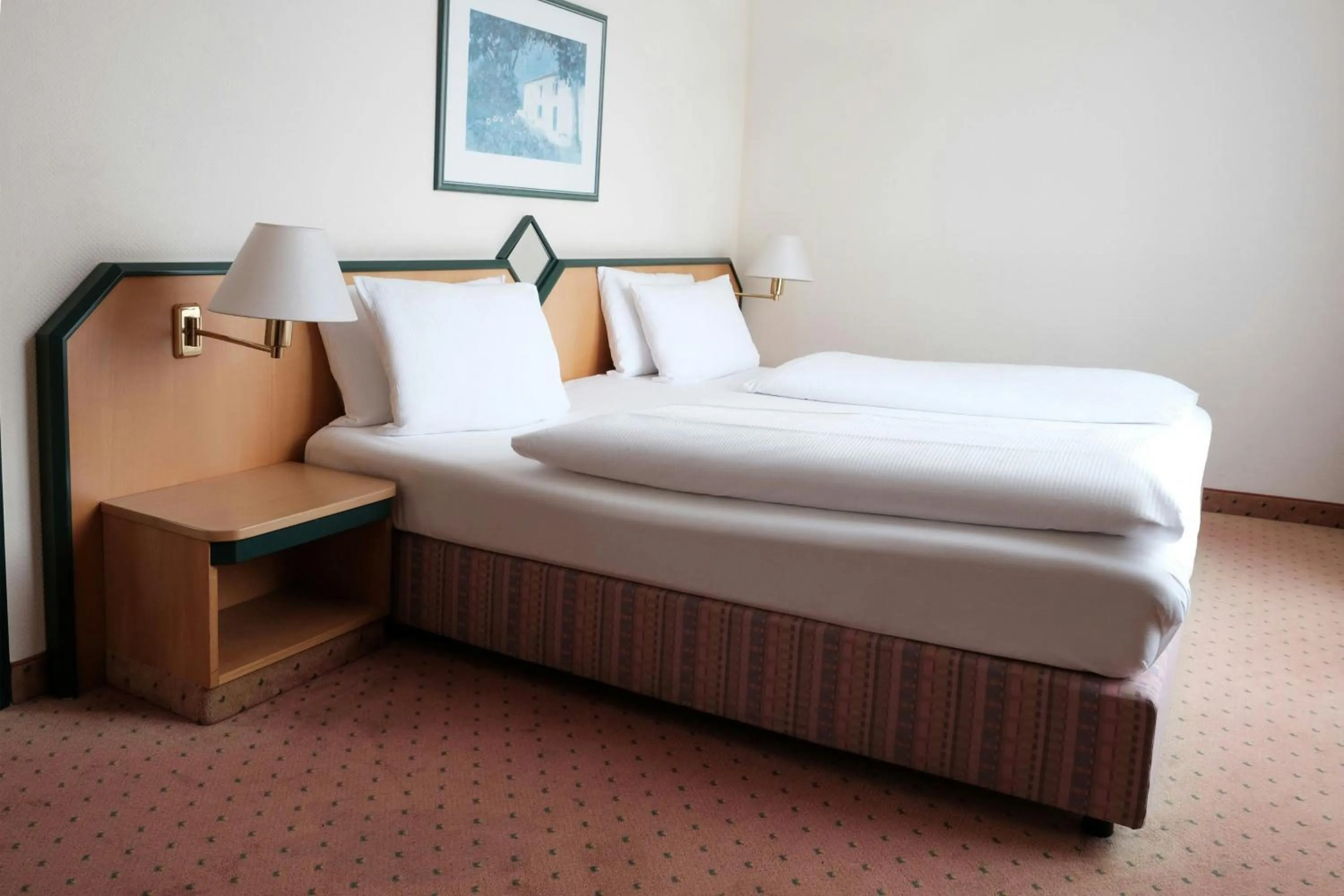 Bedroom, Bed in Holiday Inn Essen City Centre, an IHG Hotel