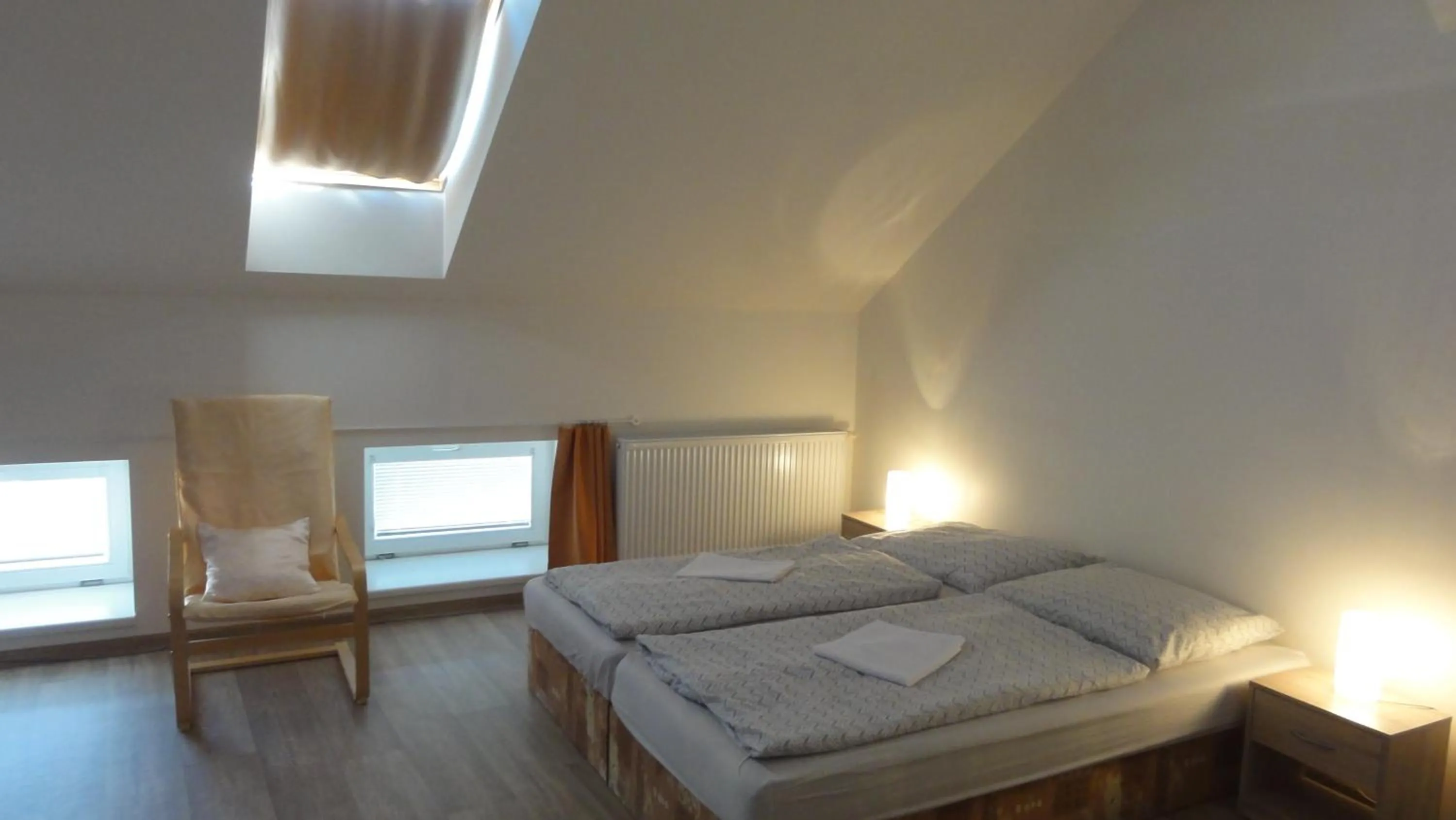 Communal lounge/ TV room, Bed in Penzion U Hradeb