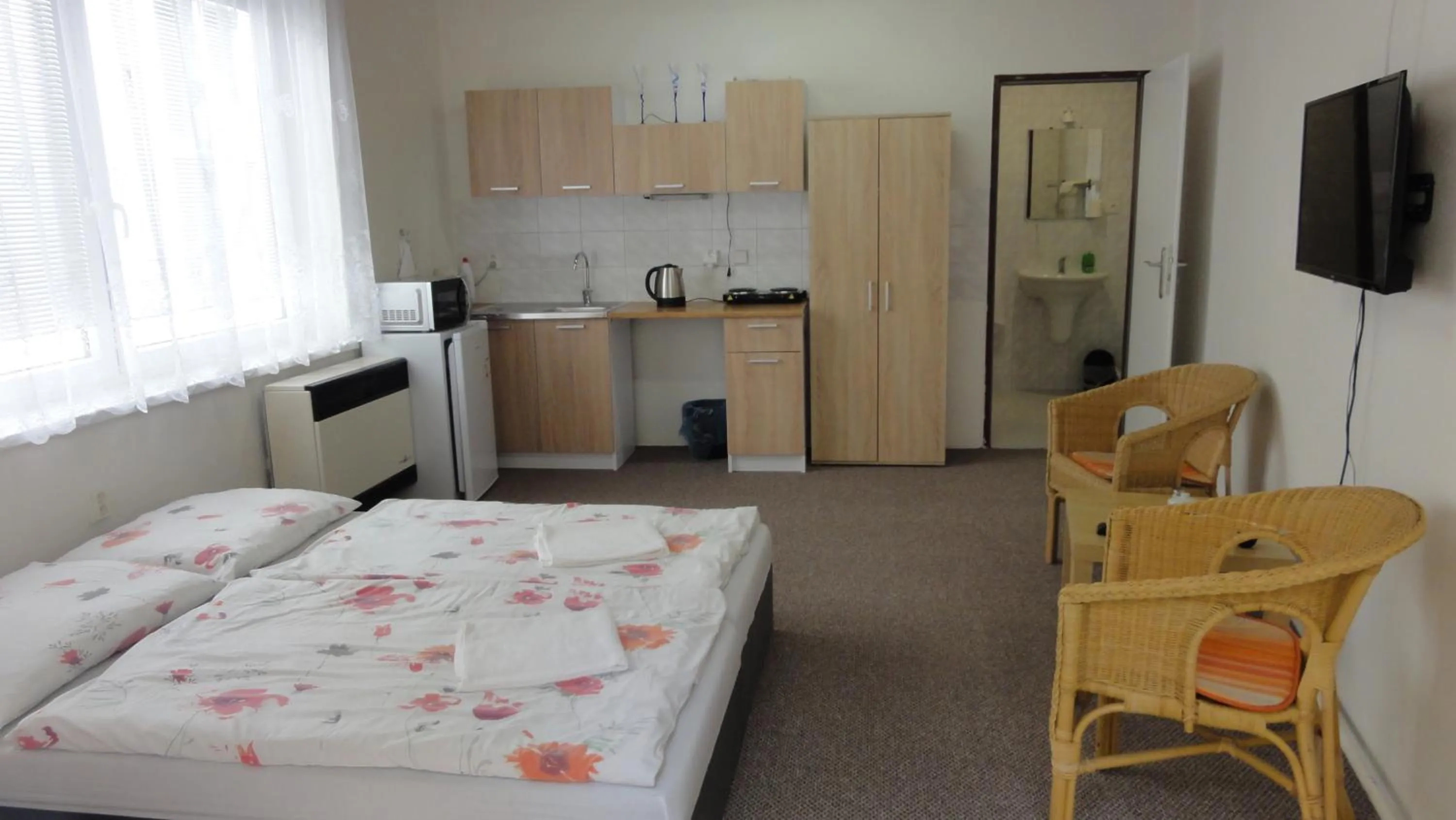 Kitchen or kitchenette, Bed in Penzion U Hradeb