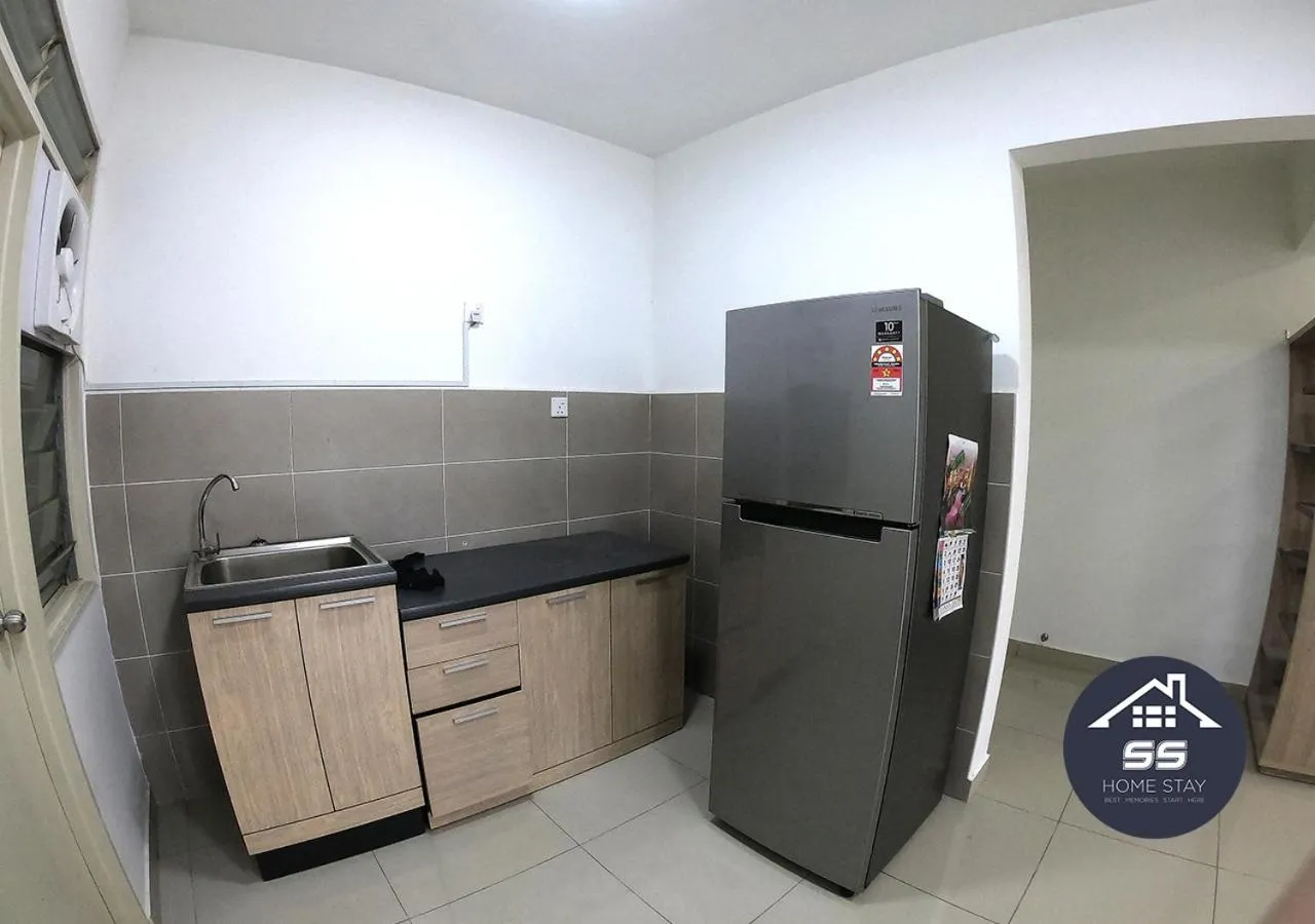 Kitchen or kitchenette in KULAI HOME STAY @IOI MALL/JPO/AEON/SENAI AIRPORT