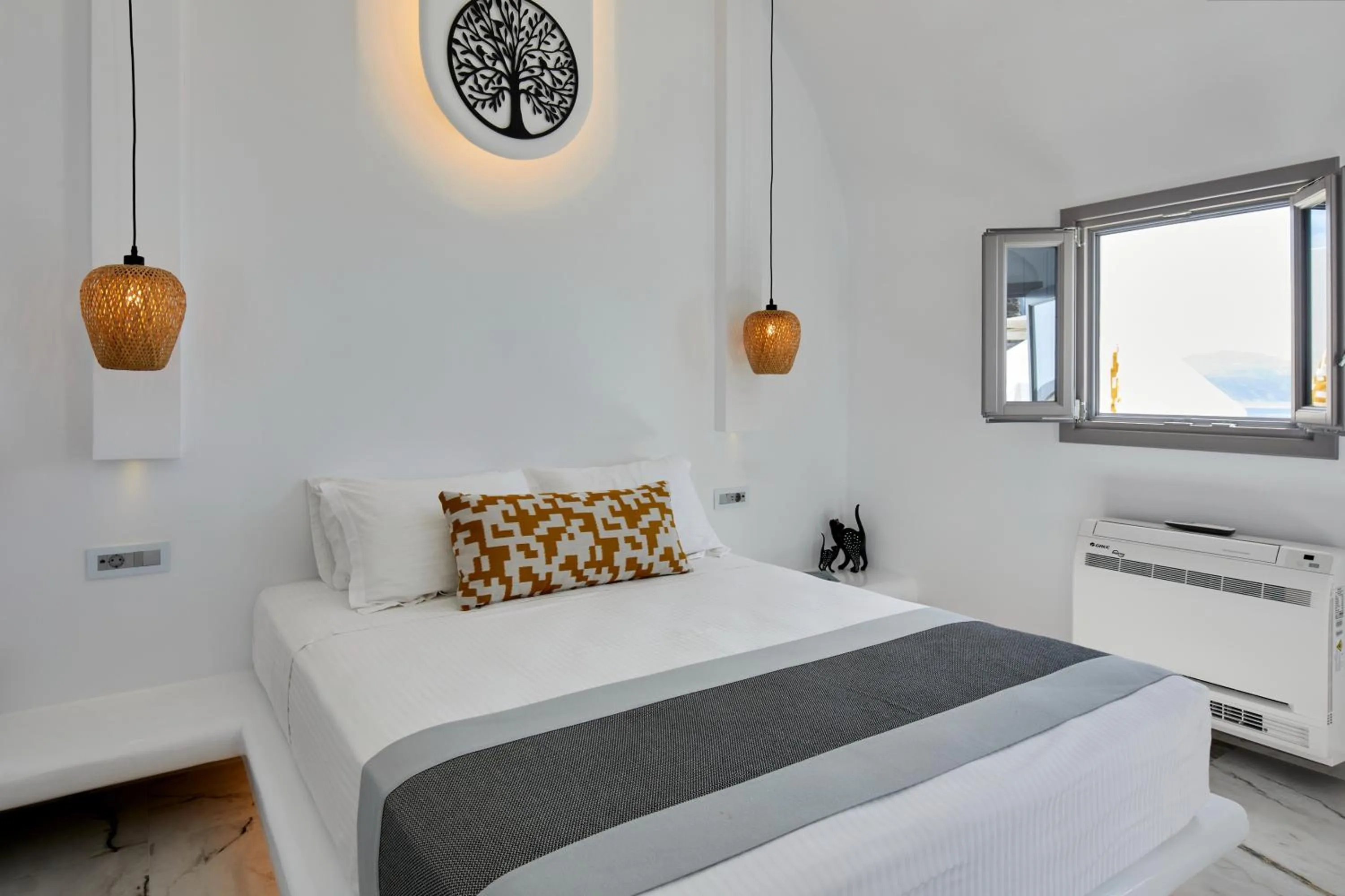 Bed in Allure Breeze Suites