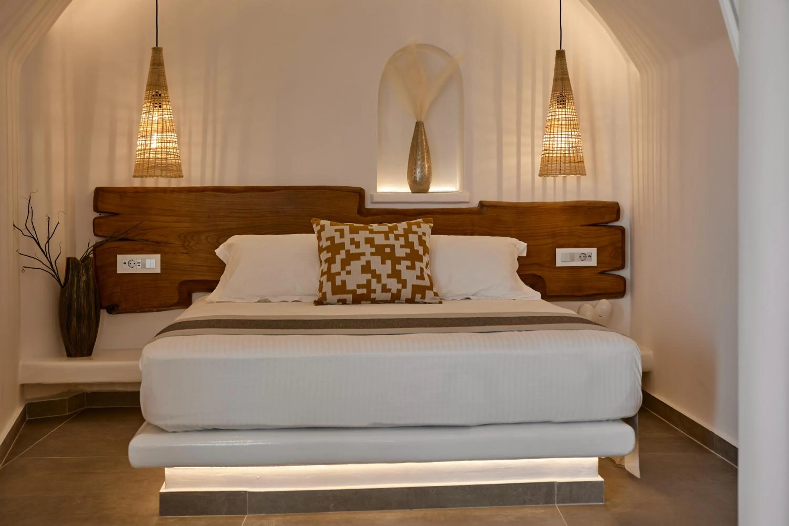 Bed in Allure Breeze Suites