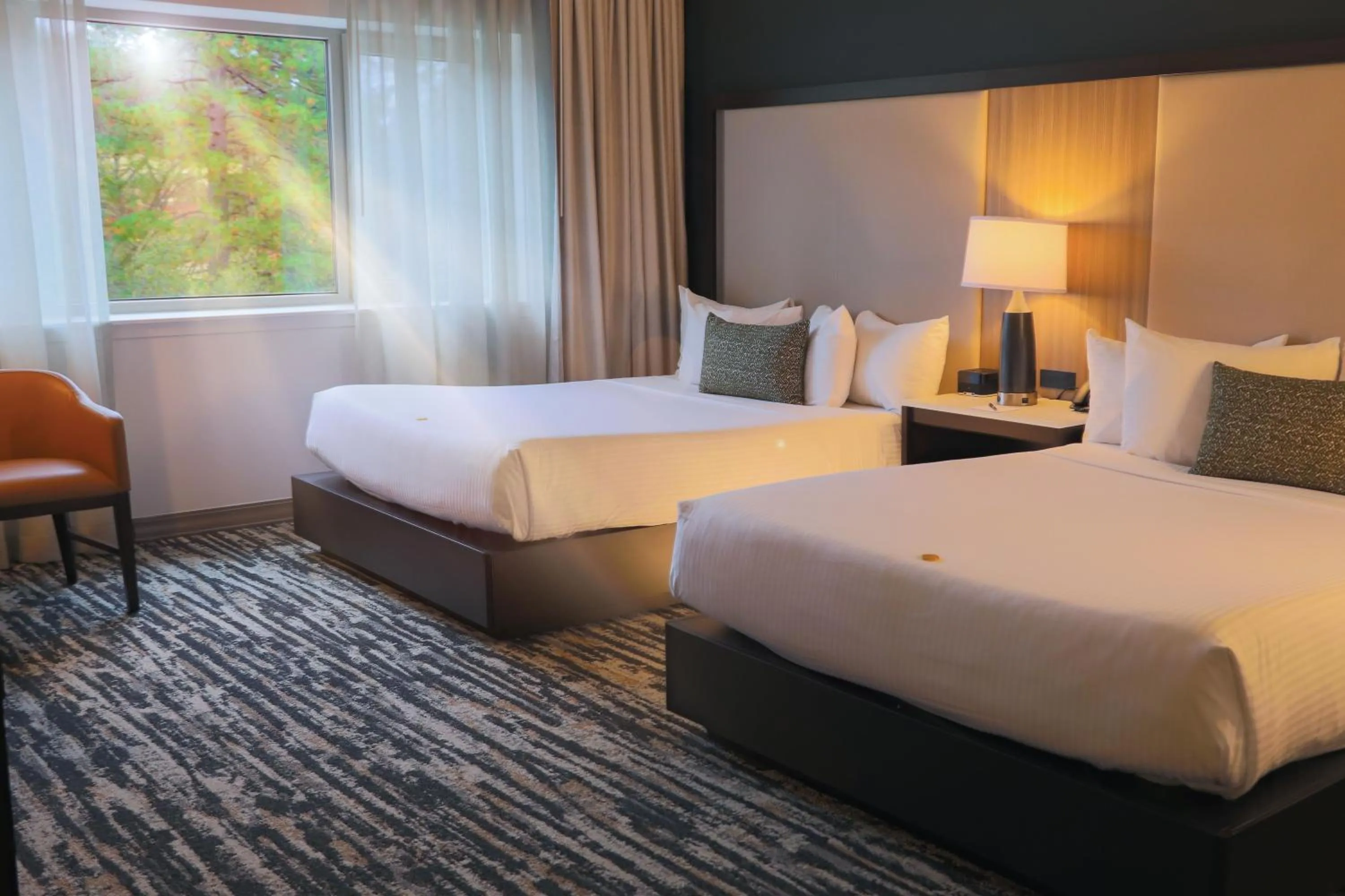 Property building, Bed in The Hotel at Black Oak Casino Resort