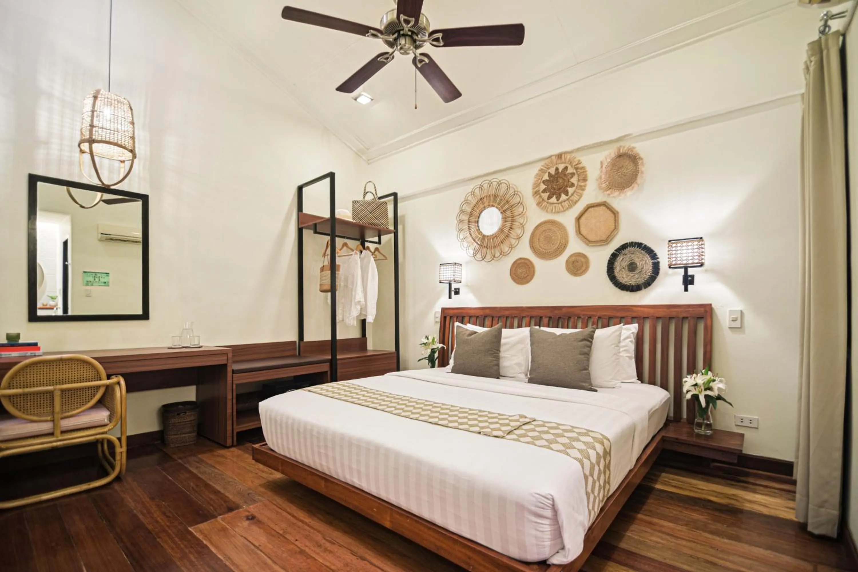 Bed in The Strand Boutique Resort