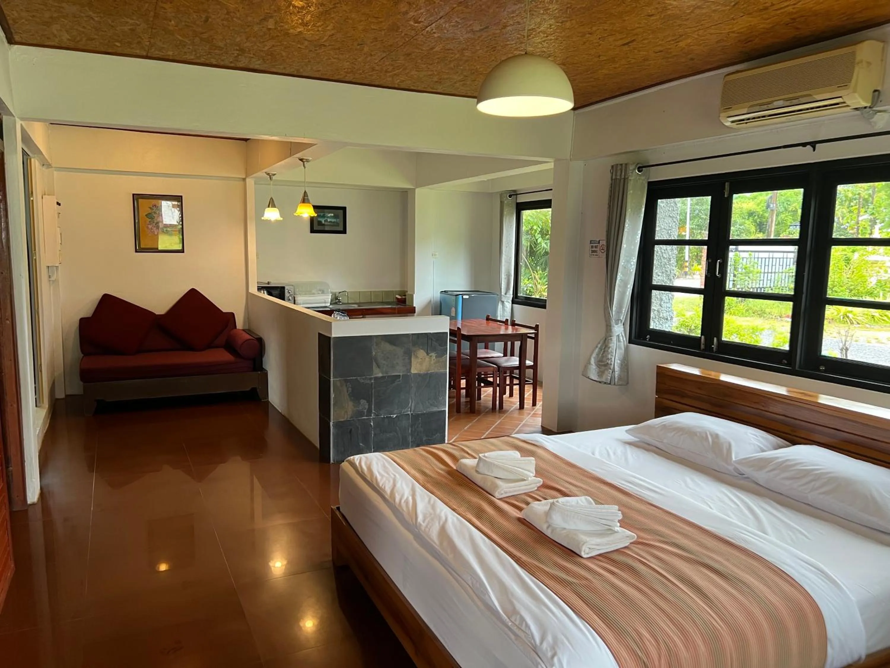 Bed in The Chevalley Beach Resort