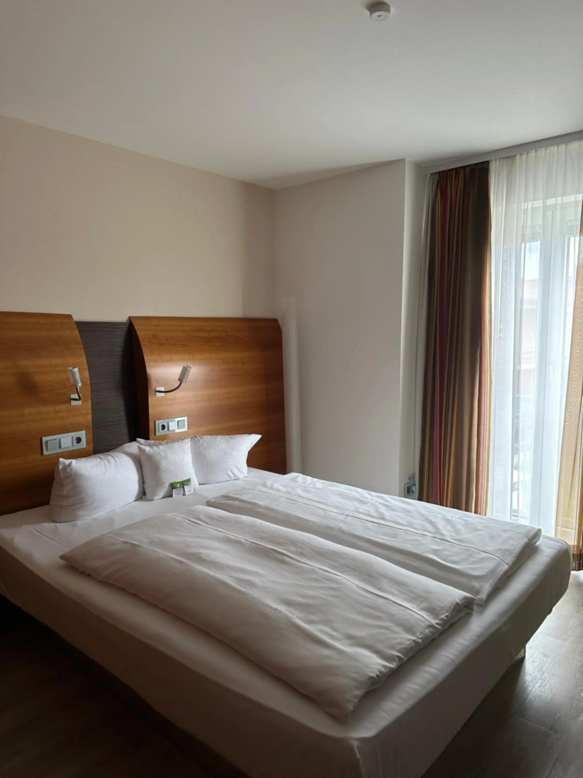 Photo of the whole room, Bed in Astralis Hotel Domizil