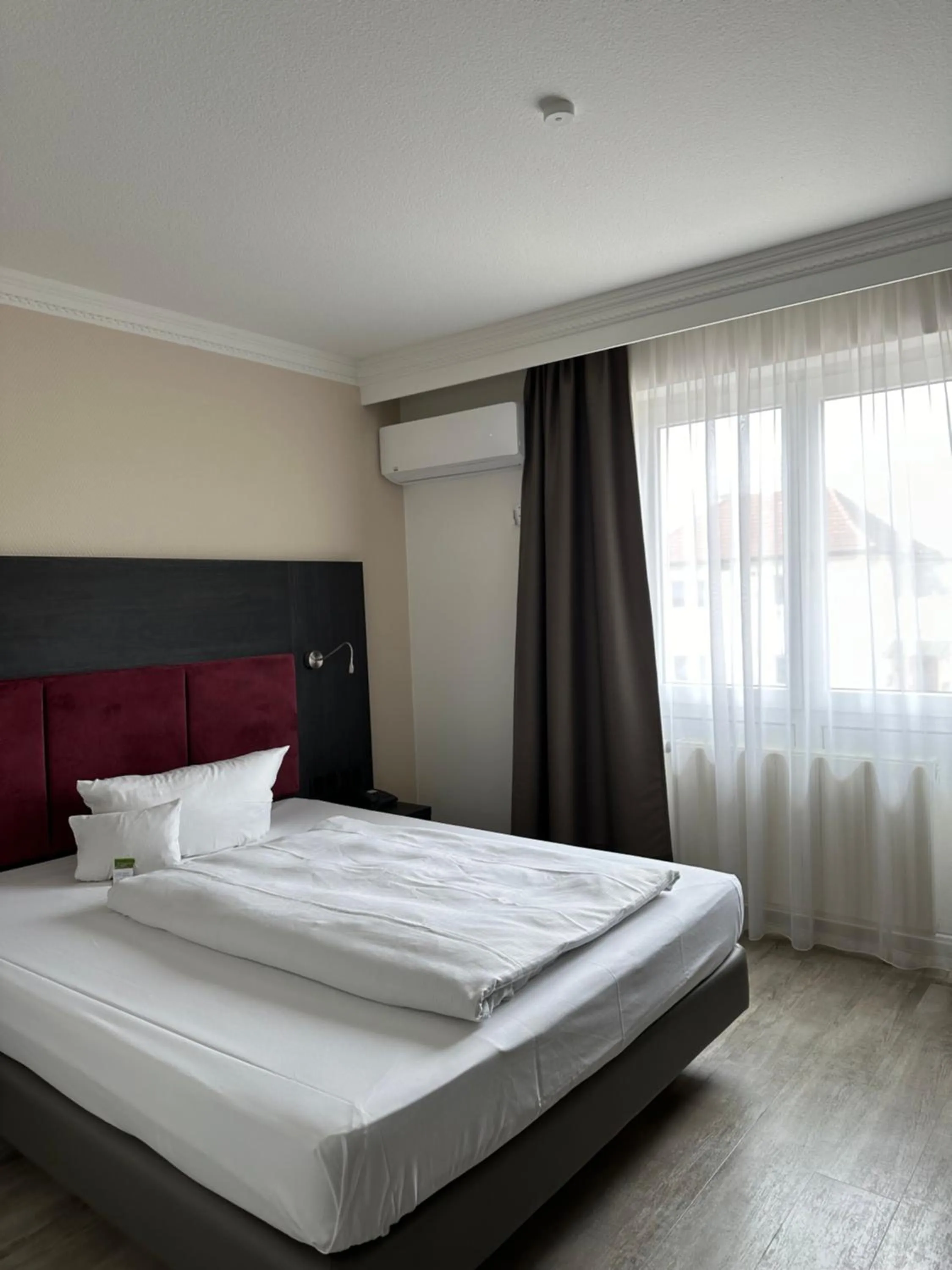 Photo of the whole room, Bed in Astralis Hotel Domizil