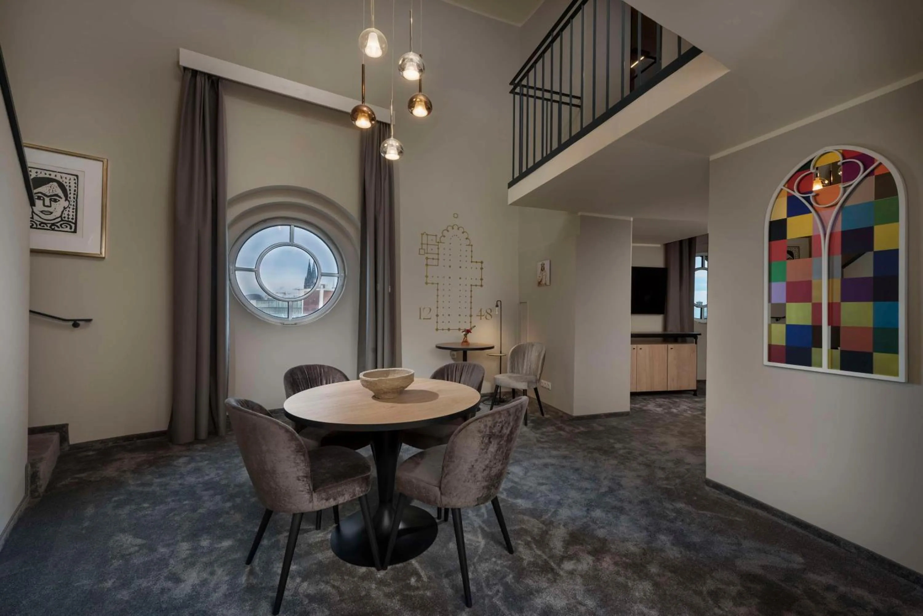 Photo of the whole room in Wasserturm Hotel Cologne, Curio Collection by Hilton