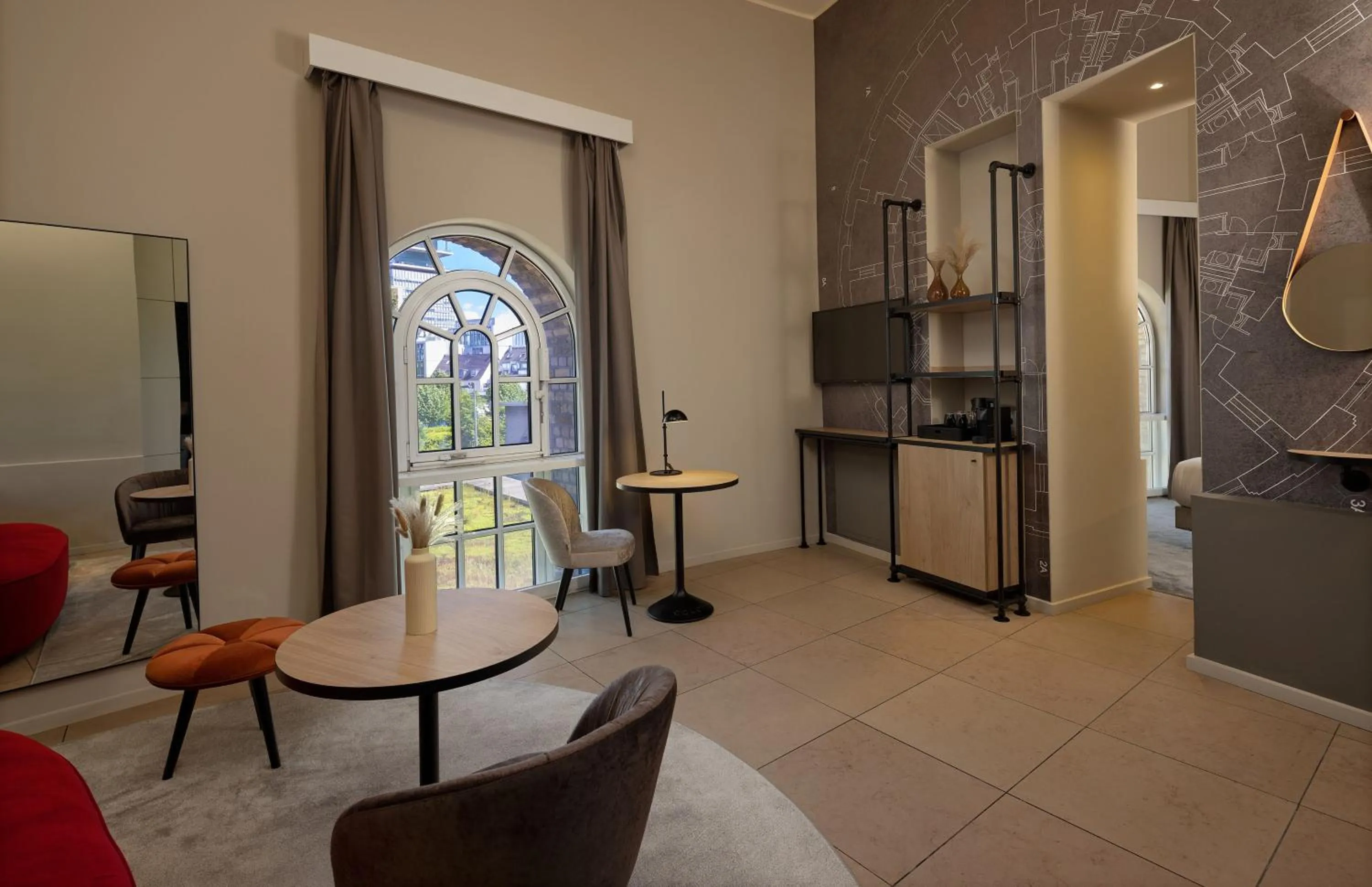 Living room in Wasserturm Hotel Cologne, Curio Collection by Hilton