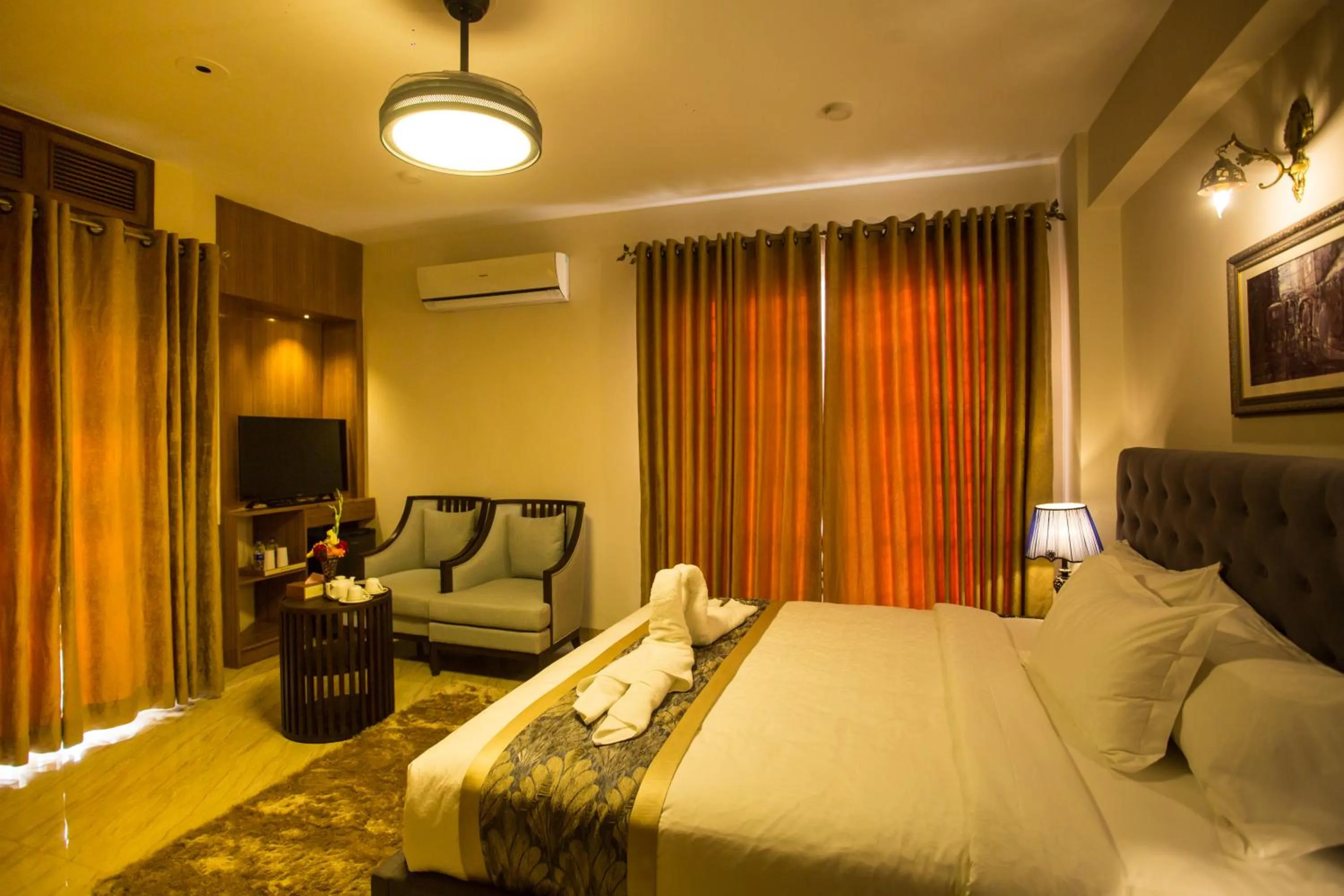 Bed in Shinepukur Suites