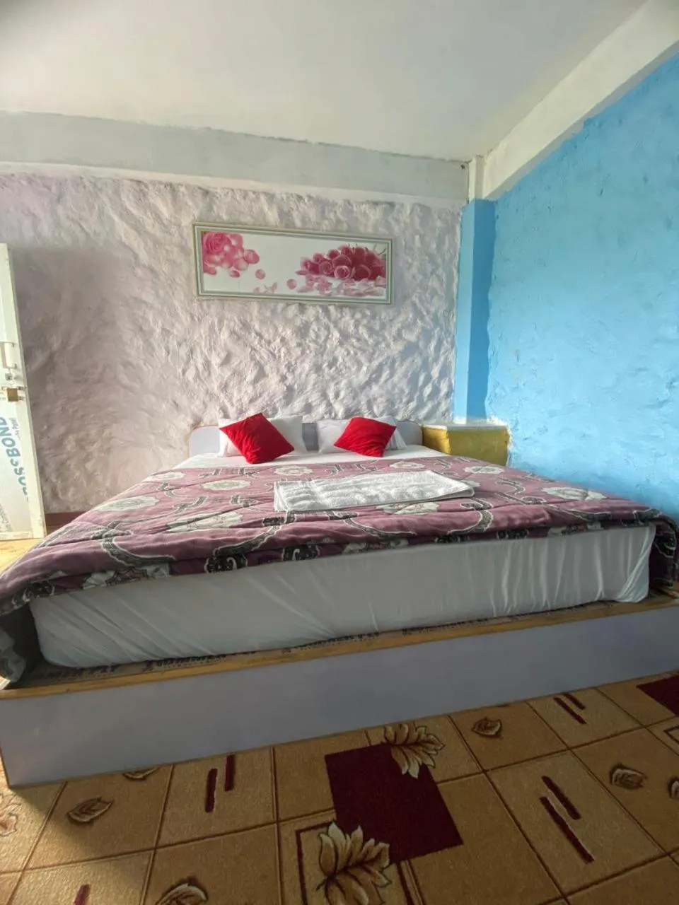 Bed in Hong Qi Hotel