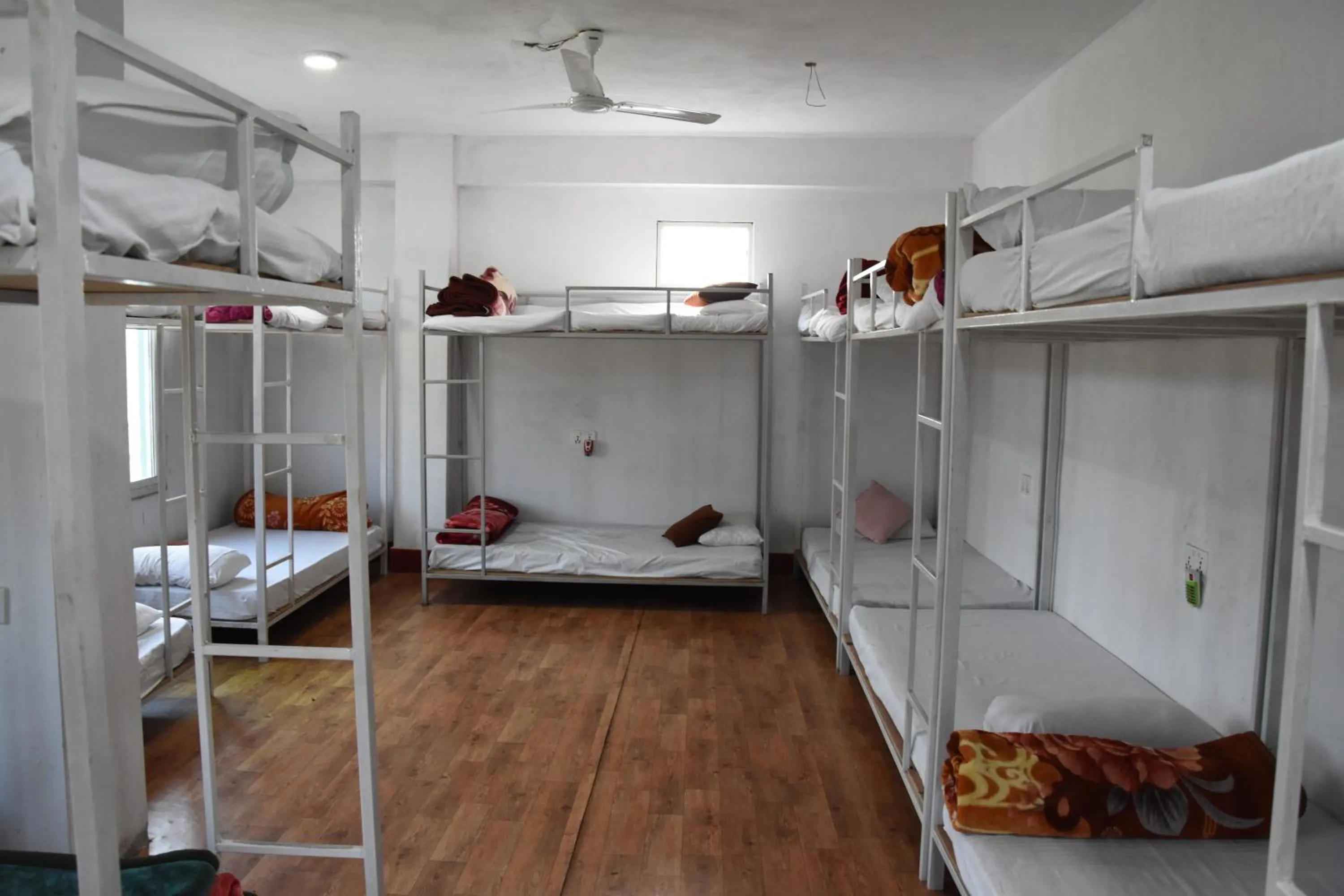 Bed in Hong Qi Hotel