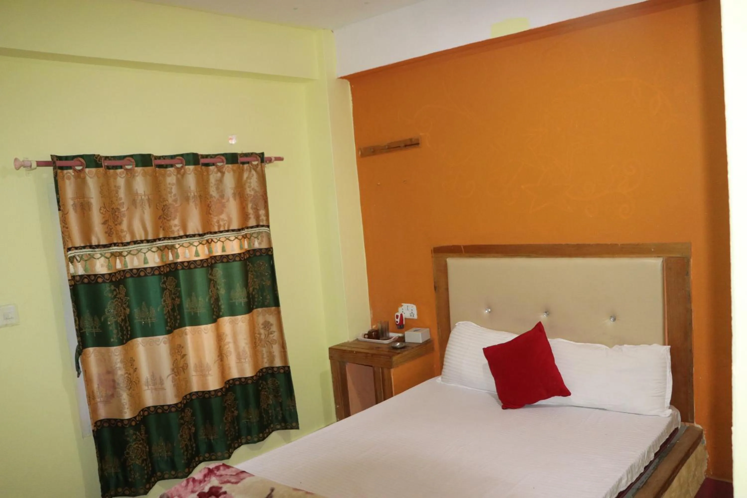 Bed in Hong Qi Hotel