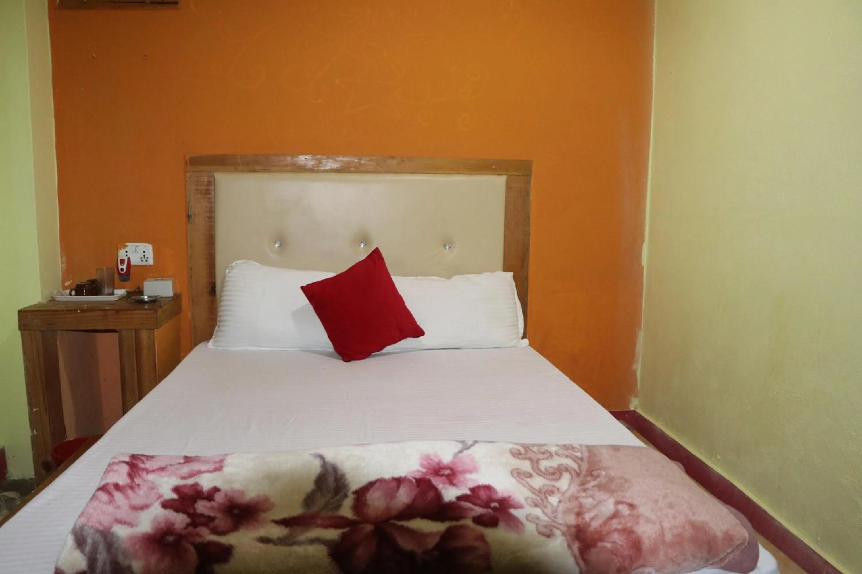 Bed in Hong Qi Hotel