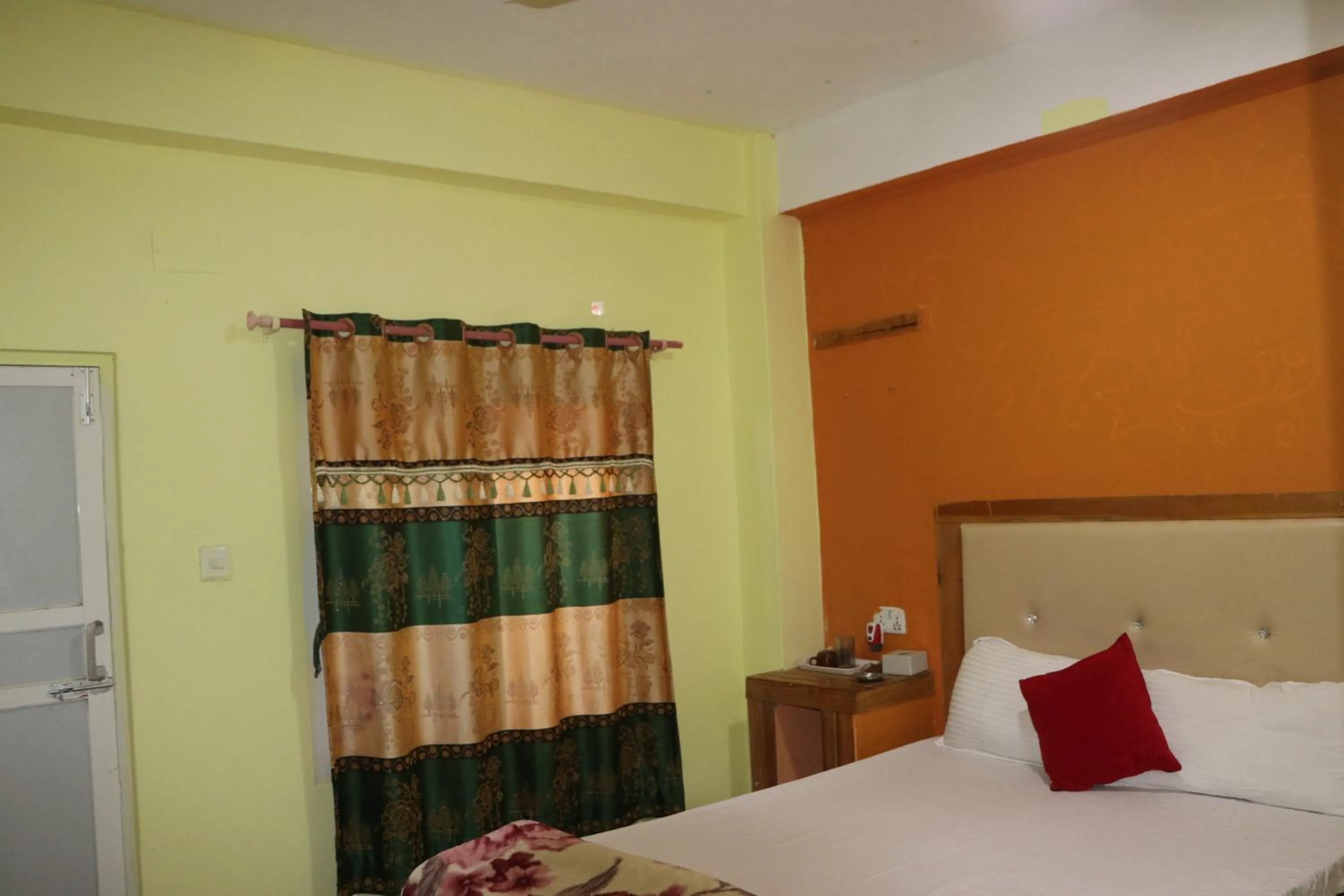 Bed in Hong Qi Hotel