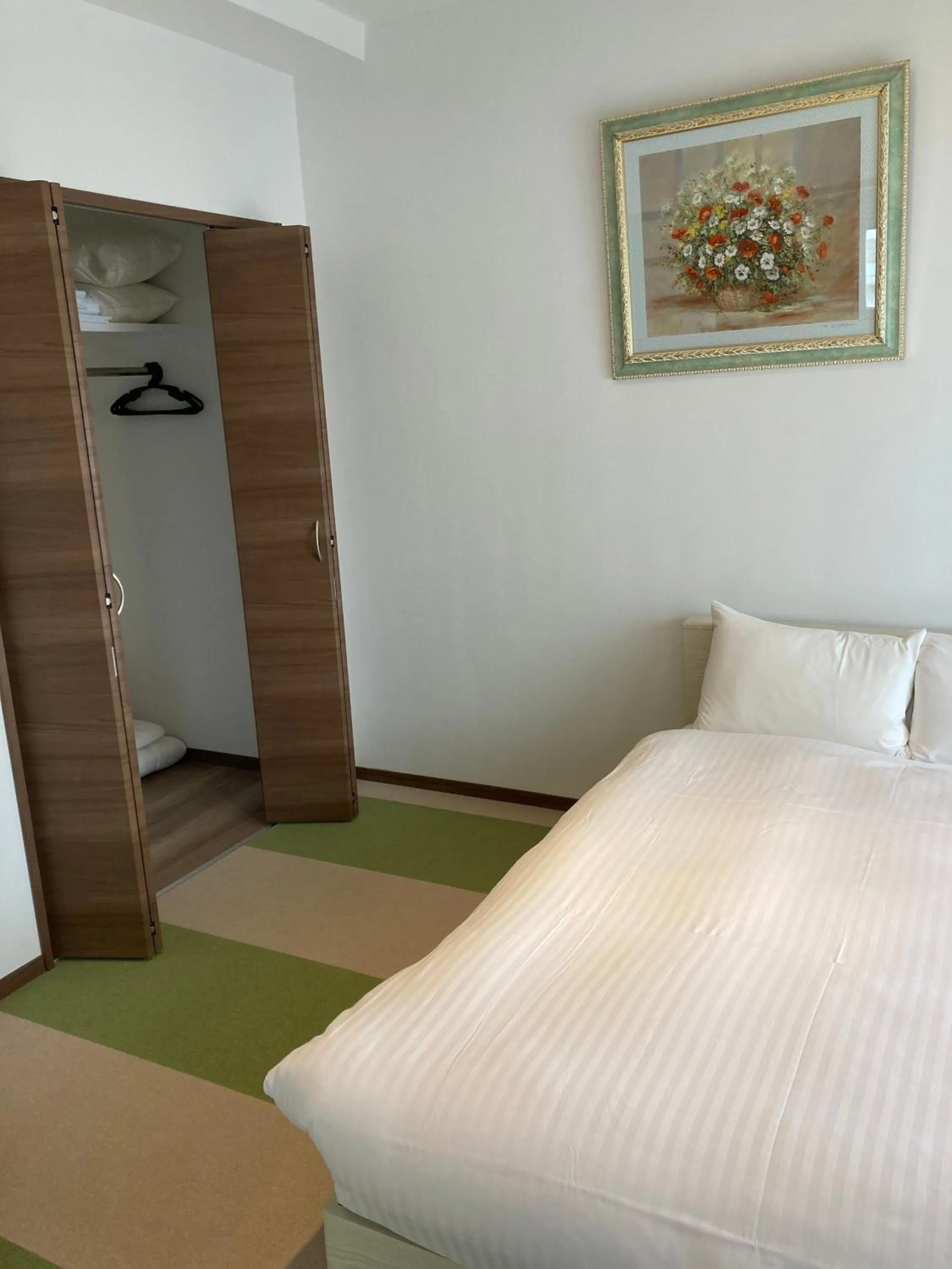 Bed in A.T. Hotel Hakata