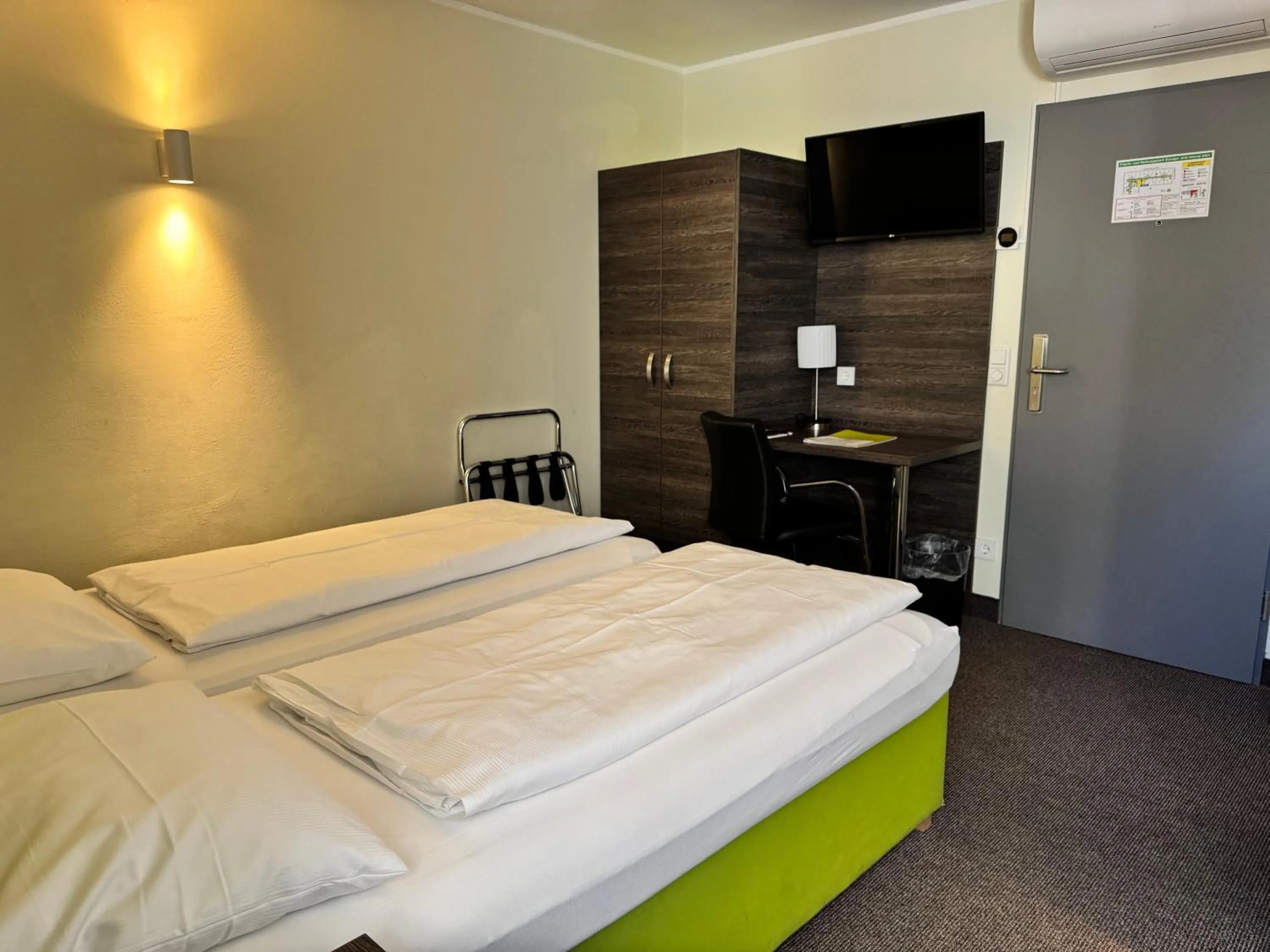 Bed in Behringers City Hotel Nürnberg