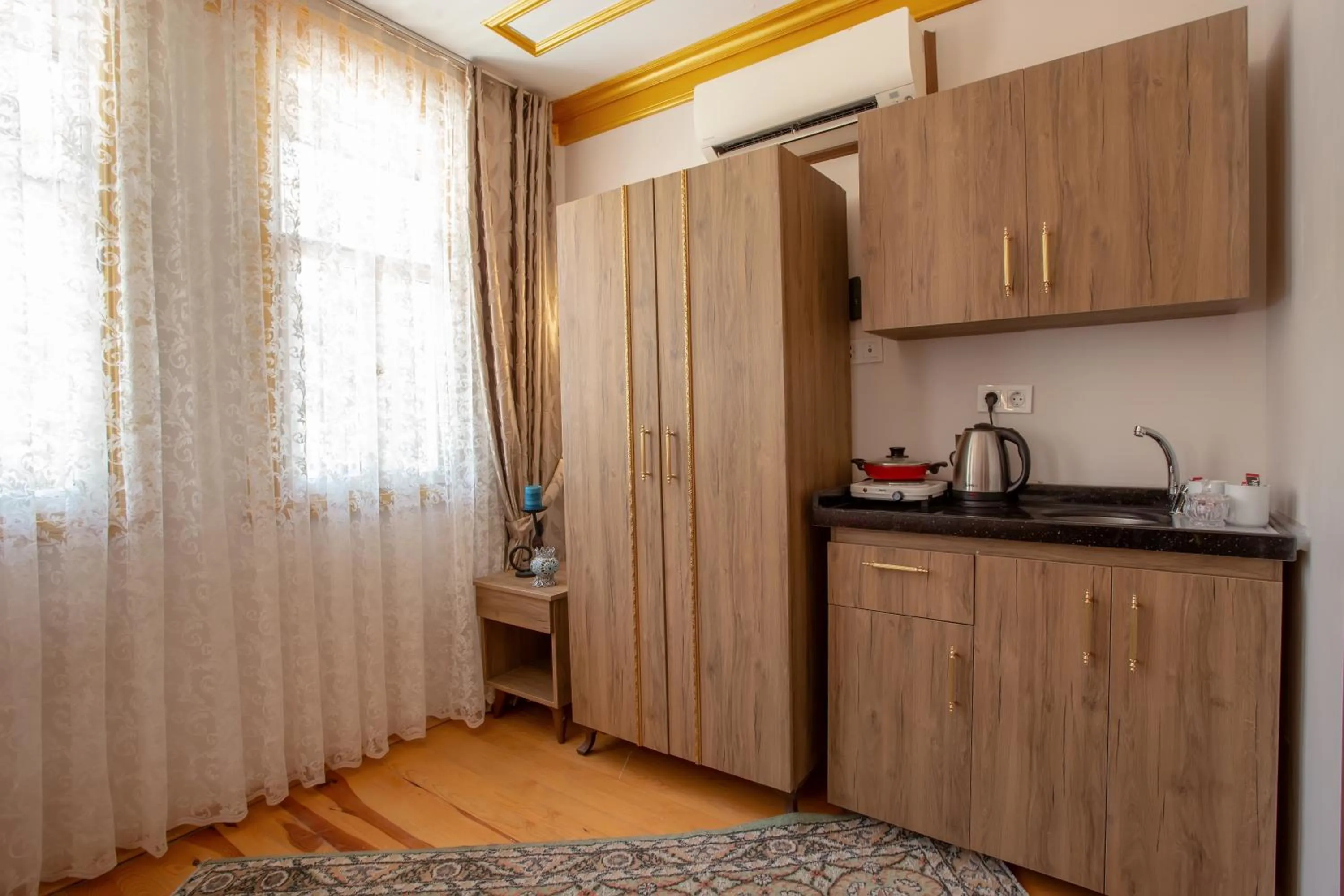 Kitchen or kitchenette in April Story Apart Hotel