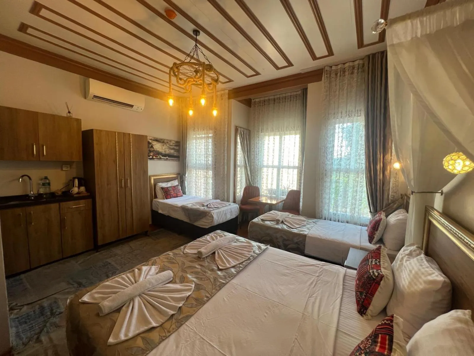 Kitchen or kitchenette, Bed in April Story Apart Hotel