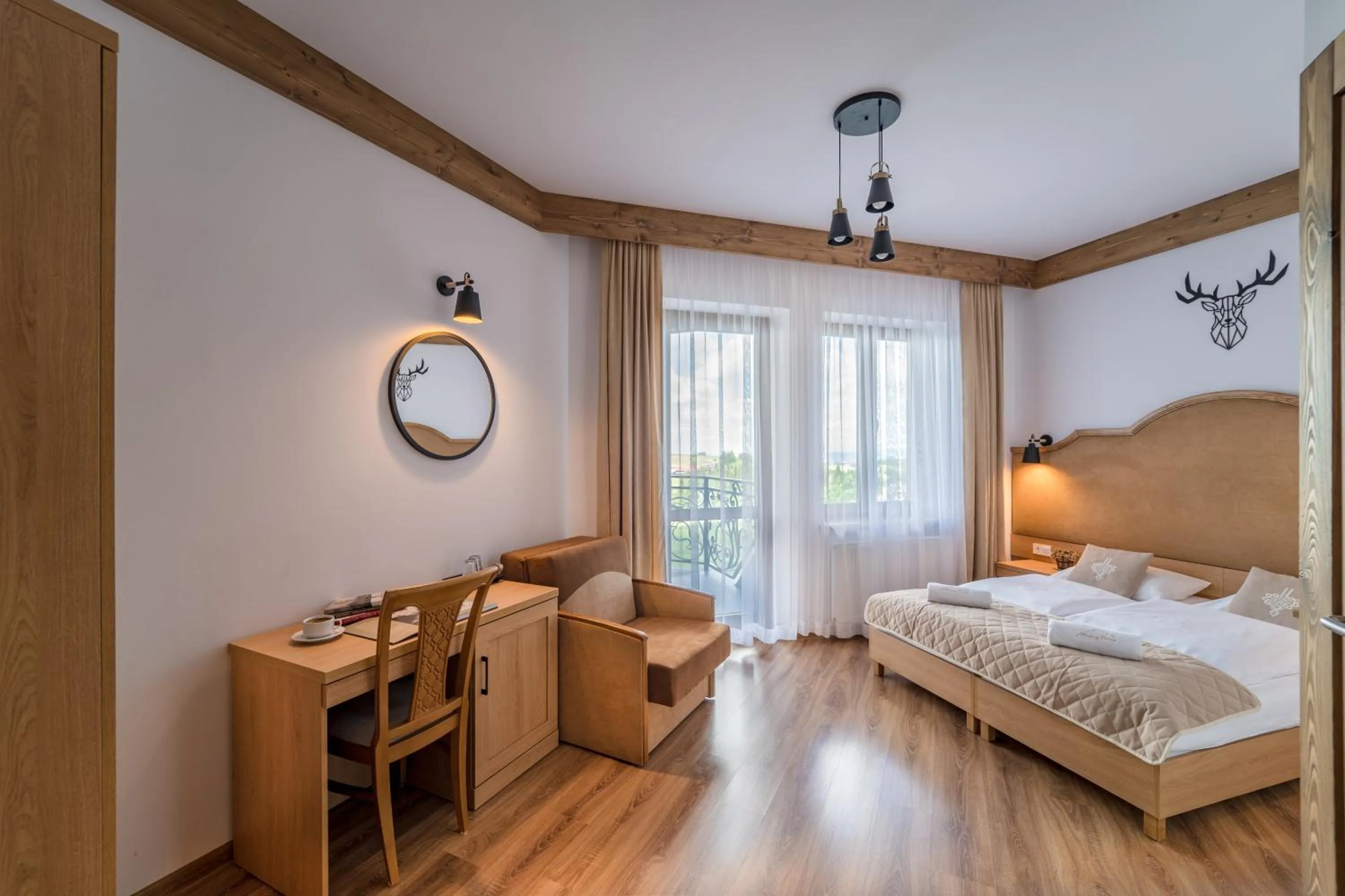 Photo of the whole room, Bed in Miodowy Dworek