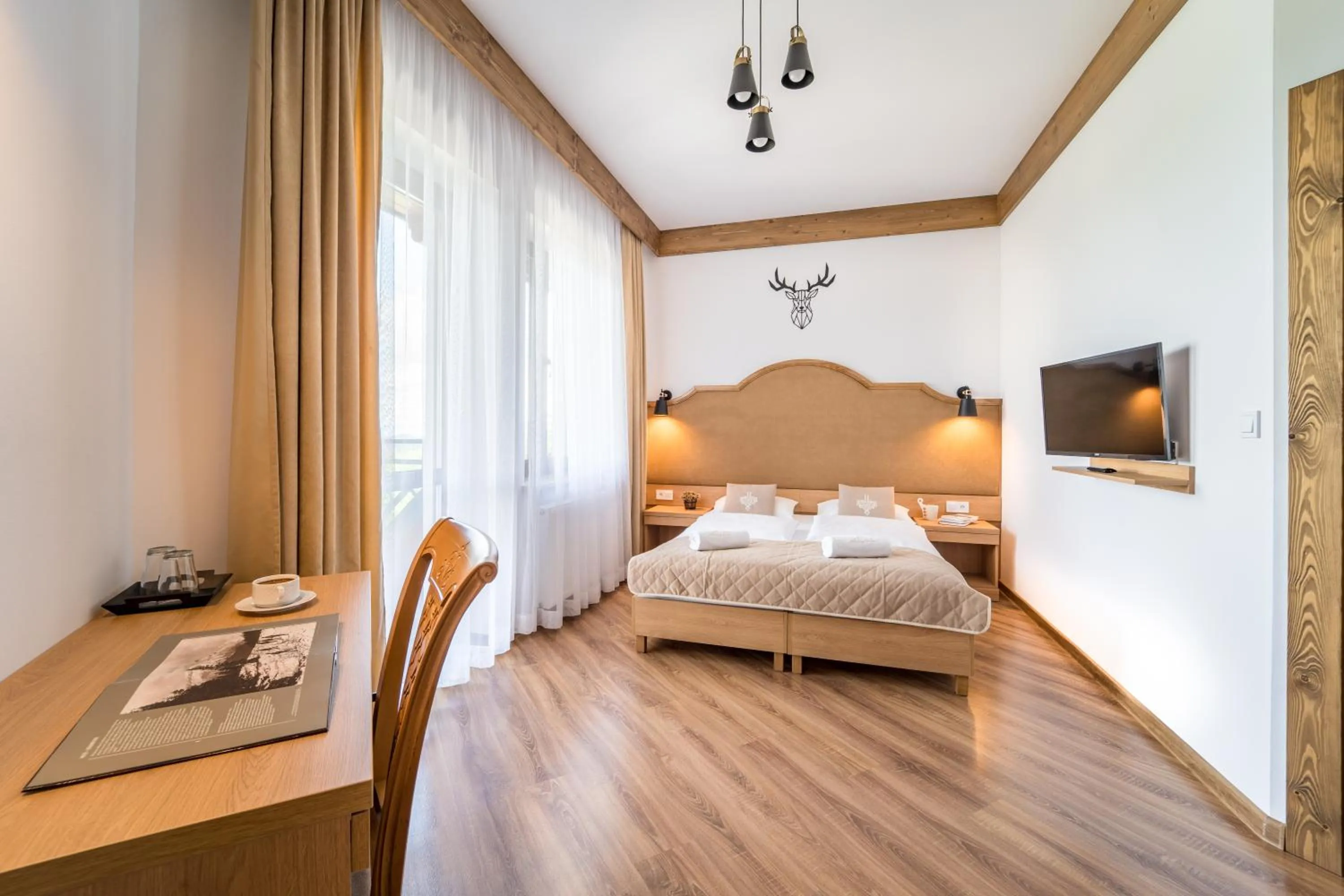 Bed in Miodowy Dworek