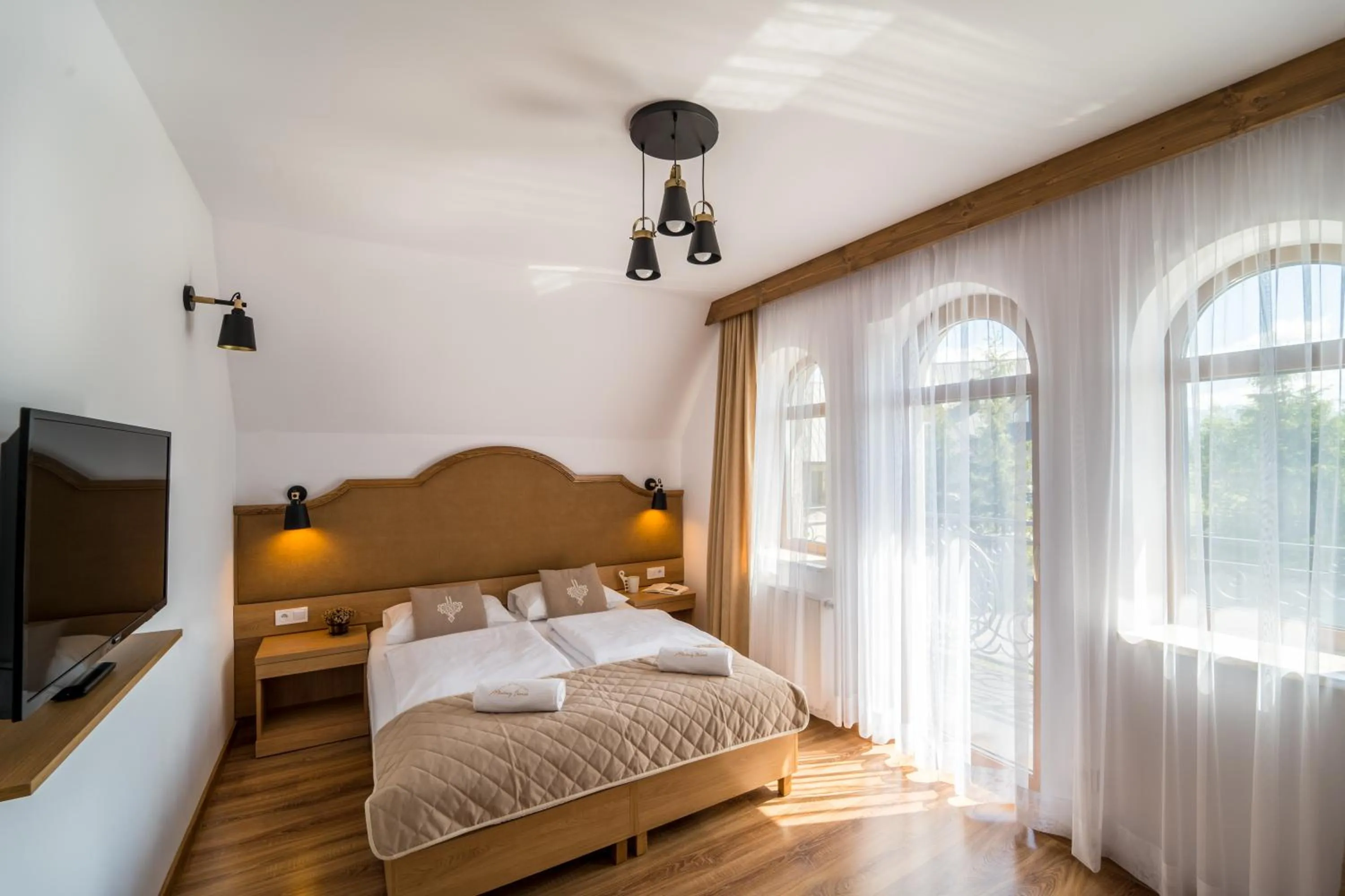 Bed in Miodowy Dworek