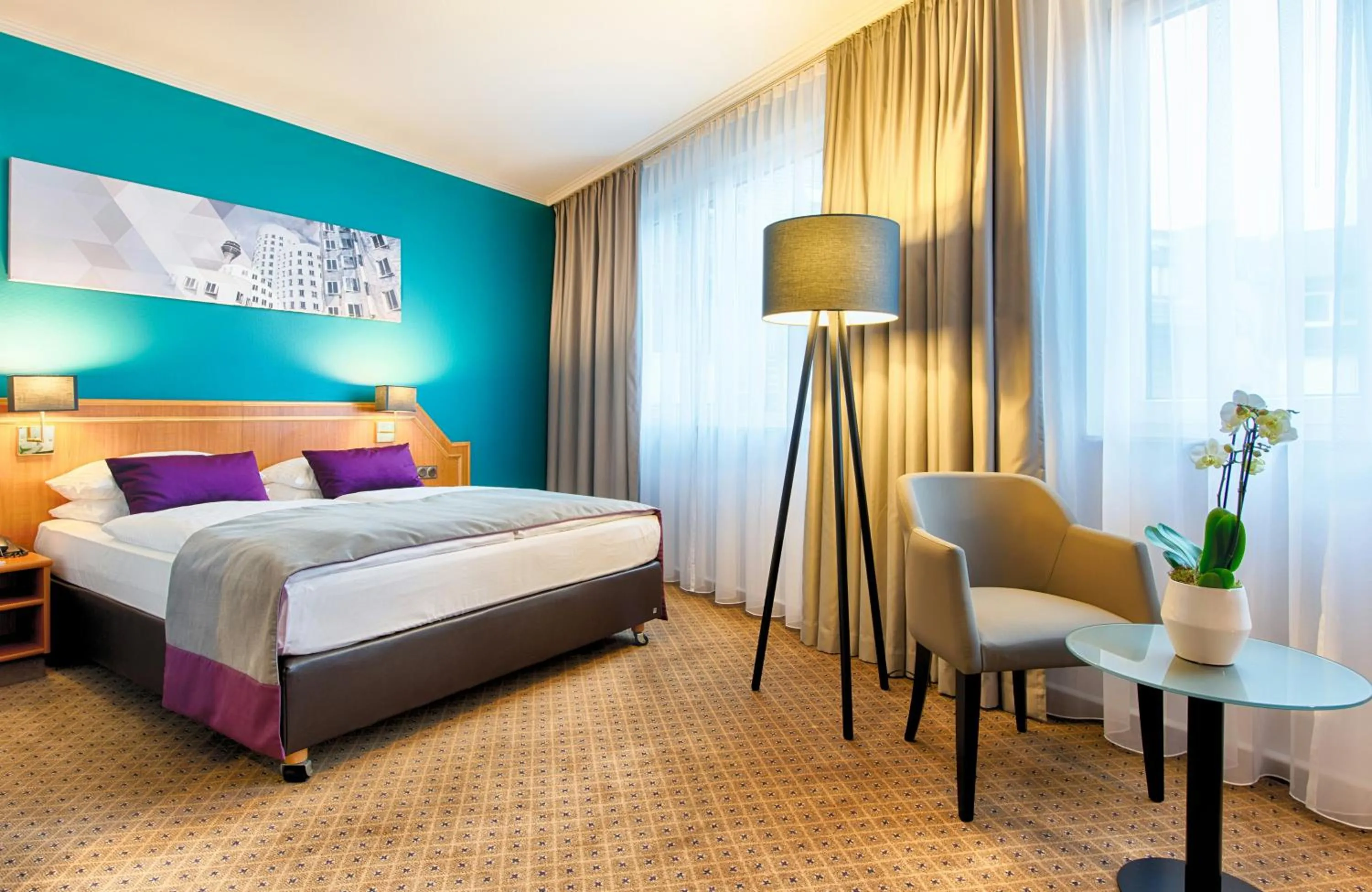 Bedroom, Bed in Leonardo Hotel Düsseldorf City Center