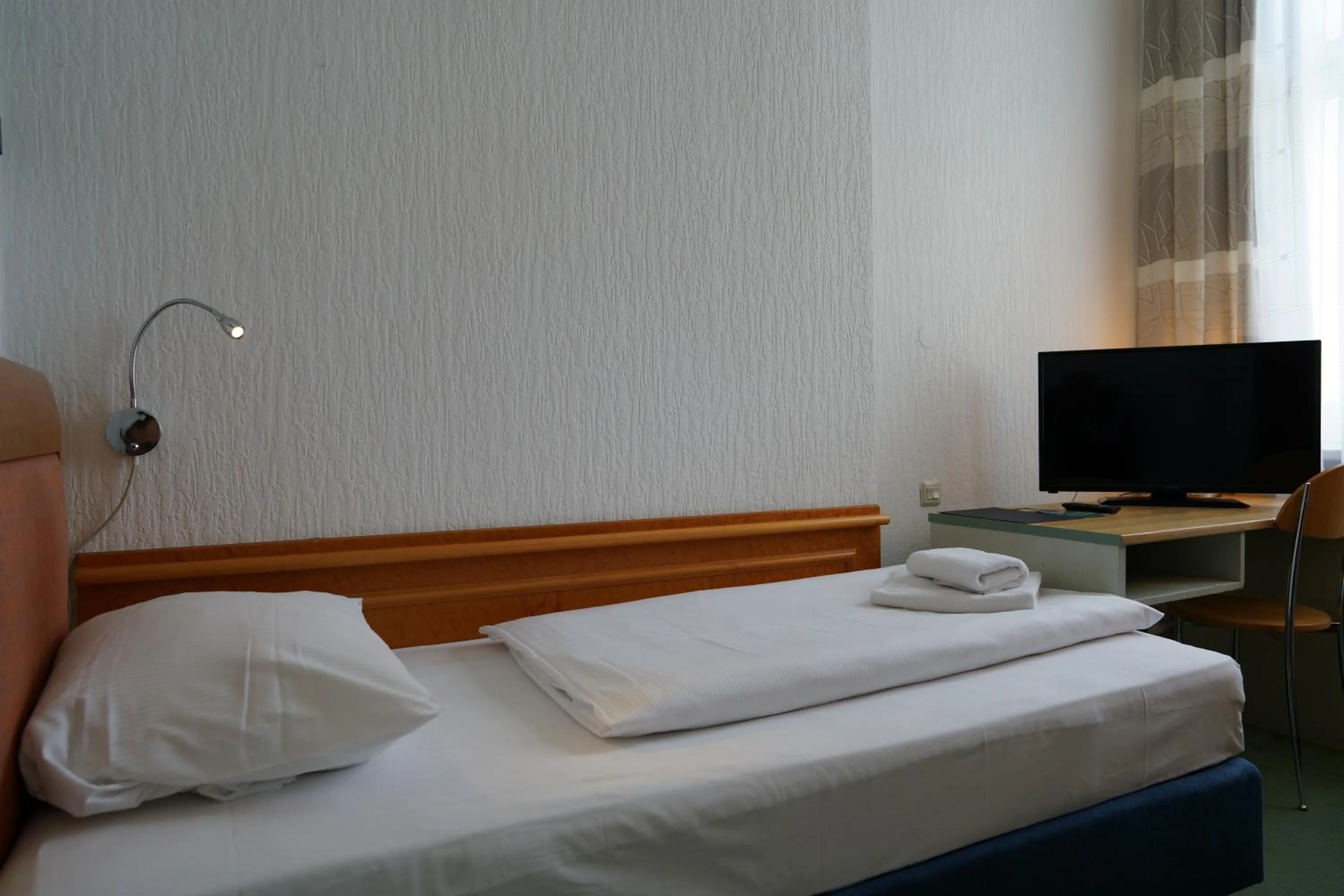 Photo of the whole room, Bed in Hotel Ambert