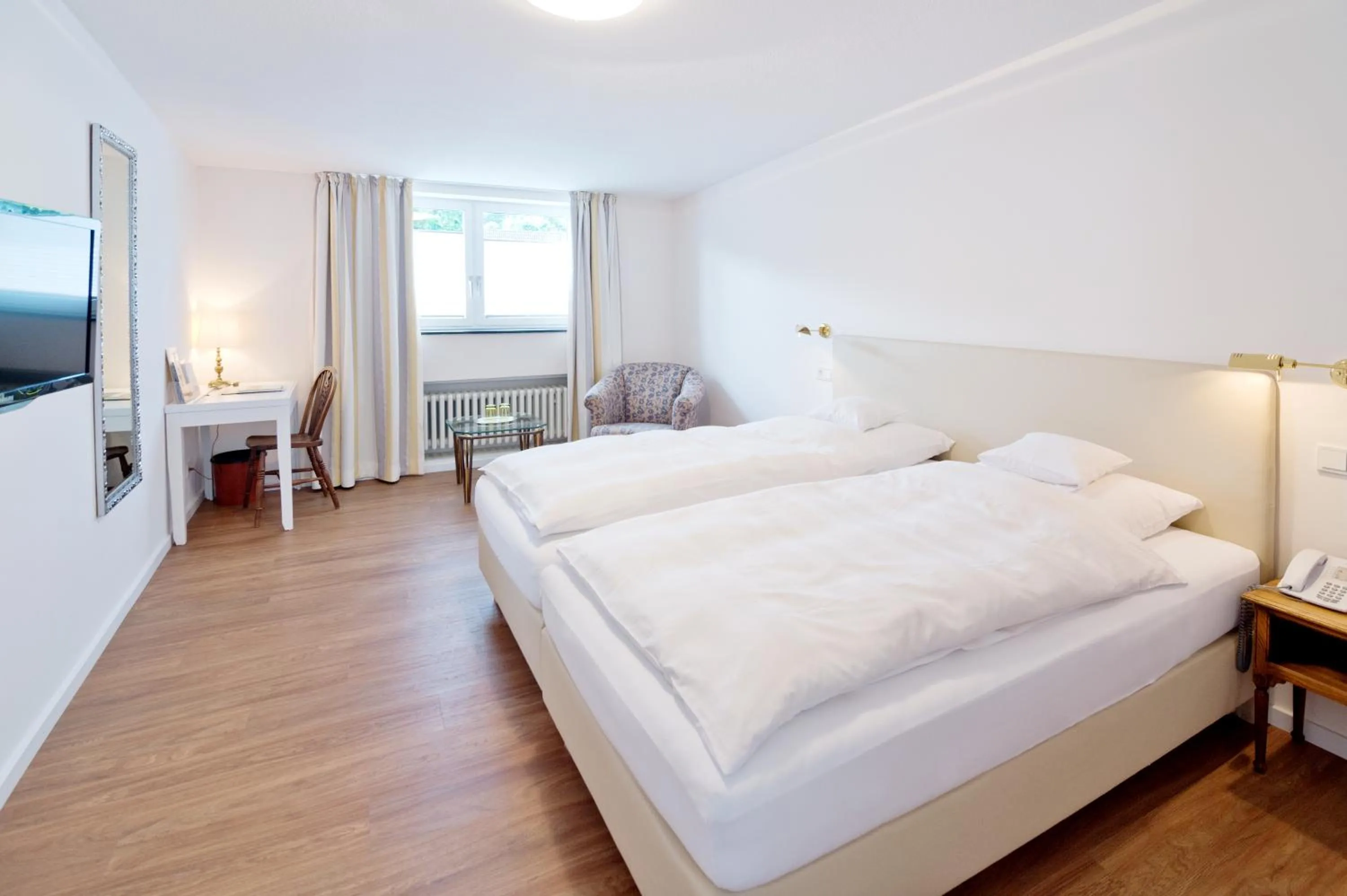 Bed in Romantik Waldhotel Mangold