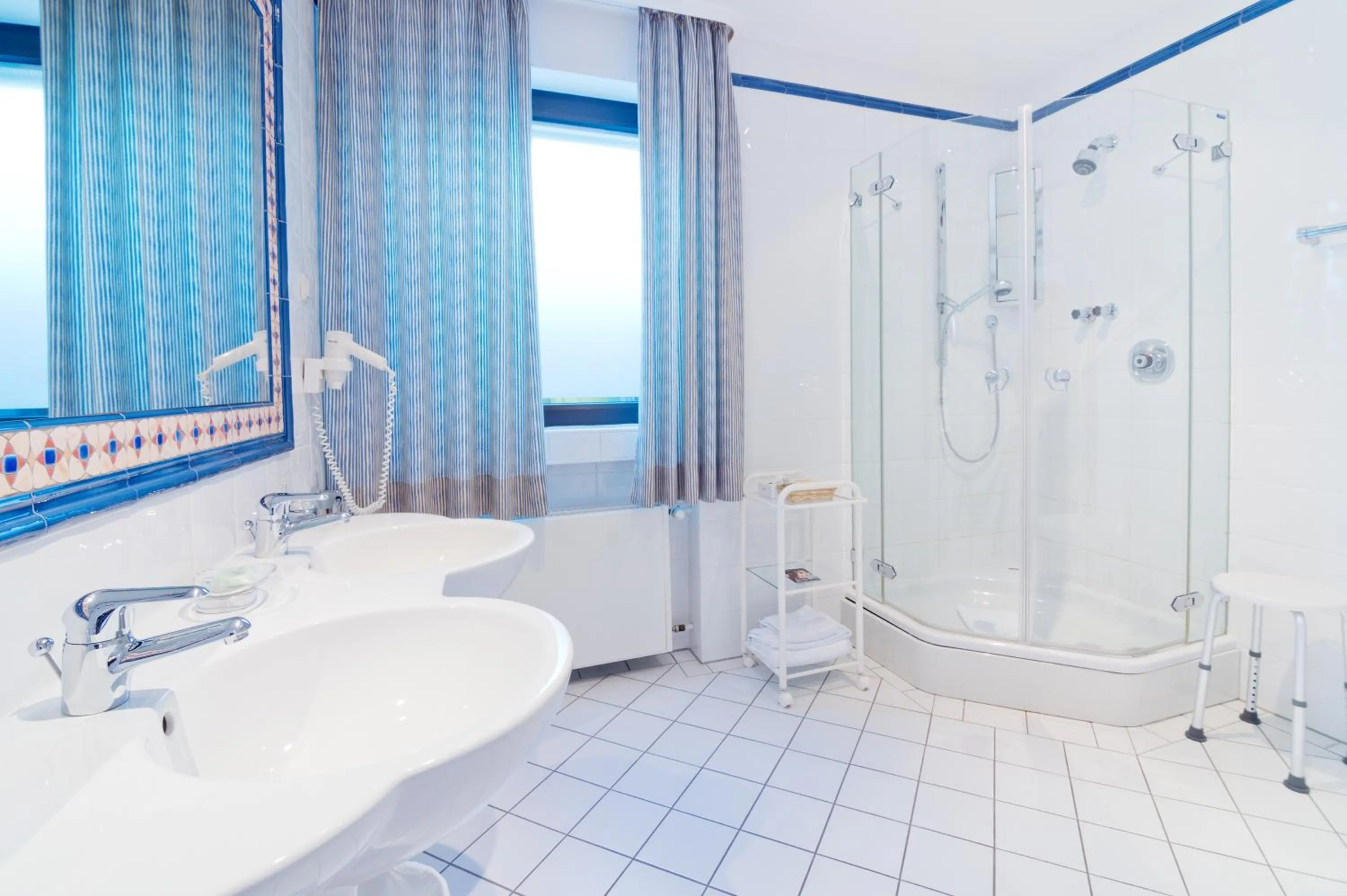 Bathroom in Romantik Waldhotel Mangold