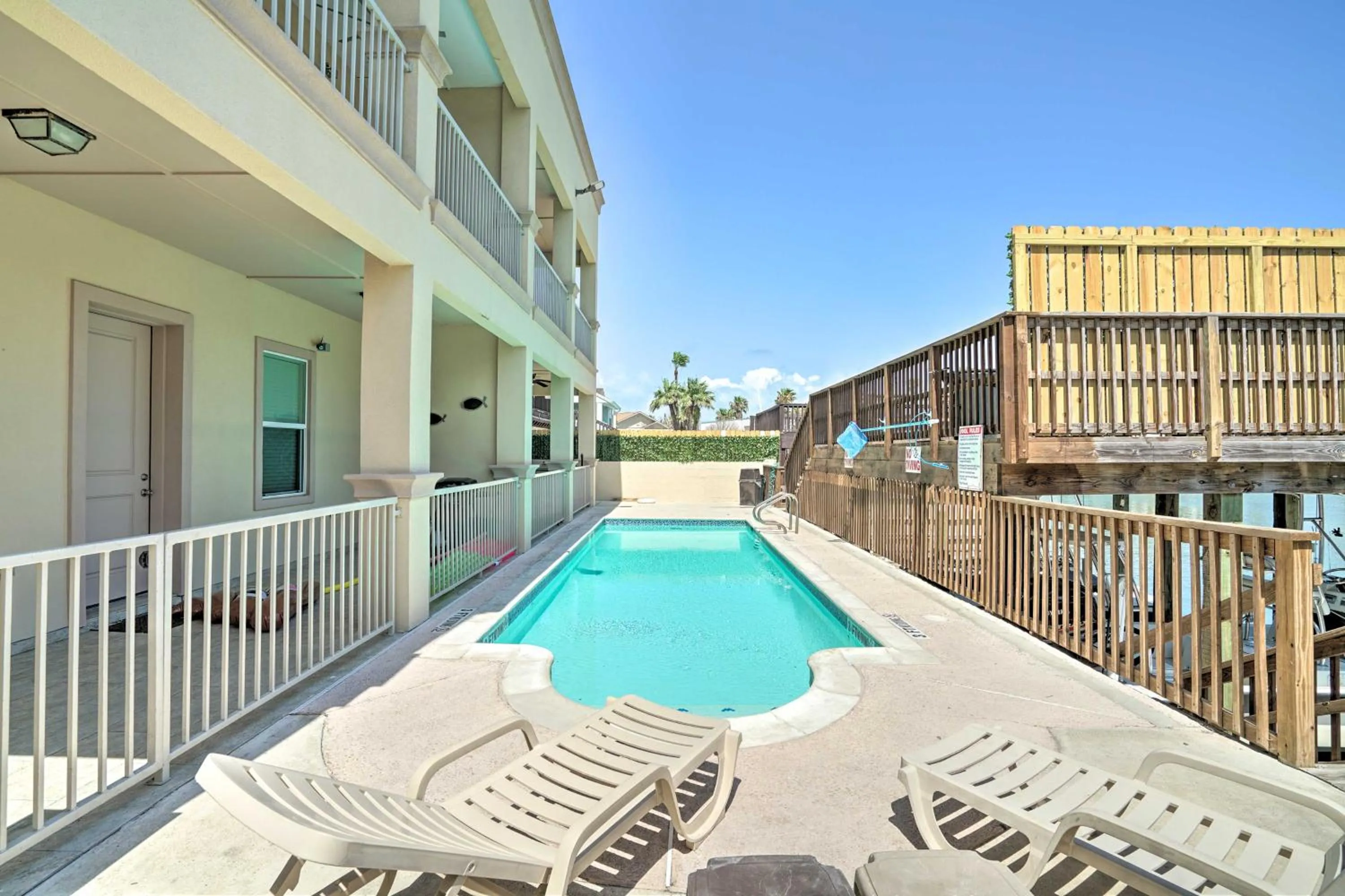 Updated Fiesta Isles Condo with Bay Views and Pool!