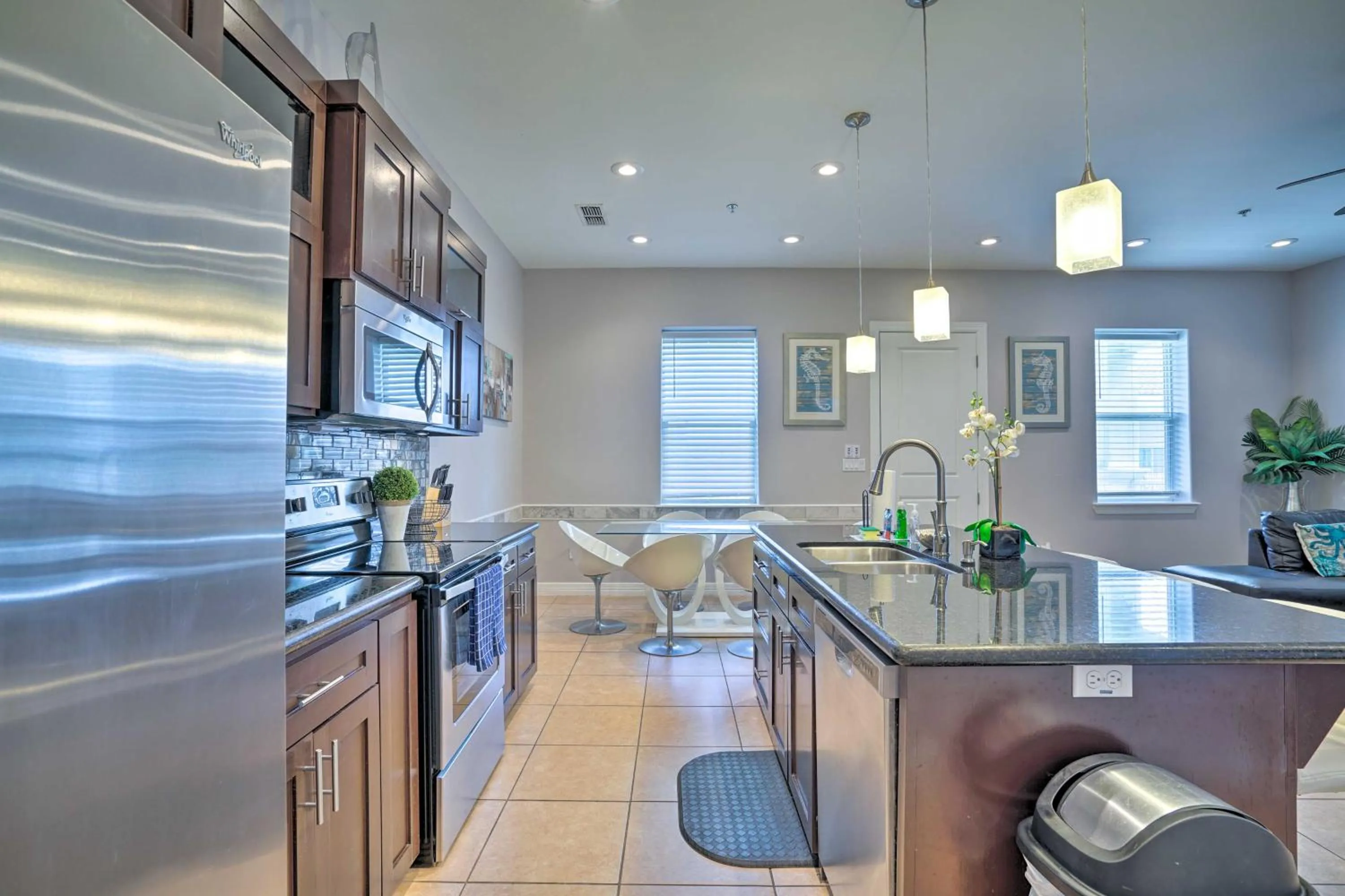 Updated Fiesta Isles Condo with Bay Views and Pool!