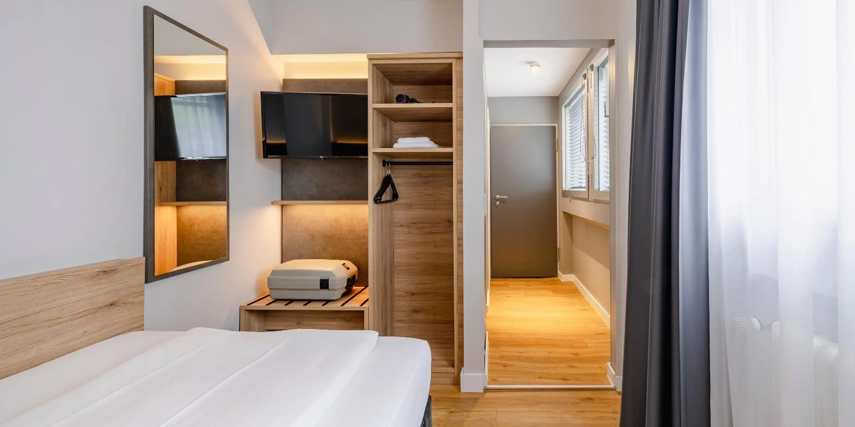 Bed in PLAZA INN Rieker Stuttgart Hauptbahnhof