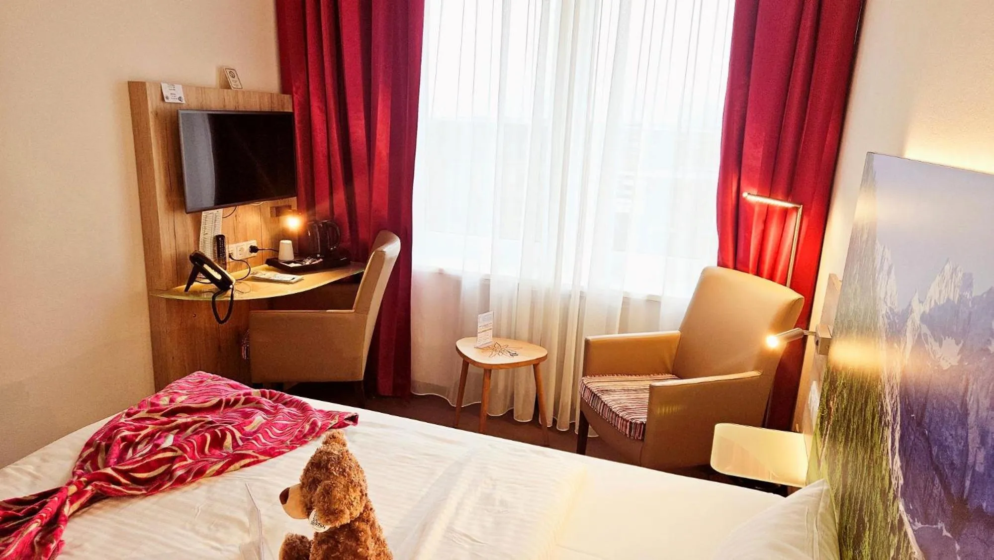 Seating area, Bed in Hotel Edel Weiss