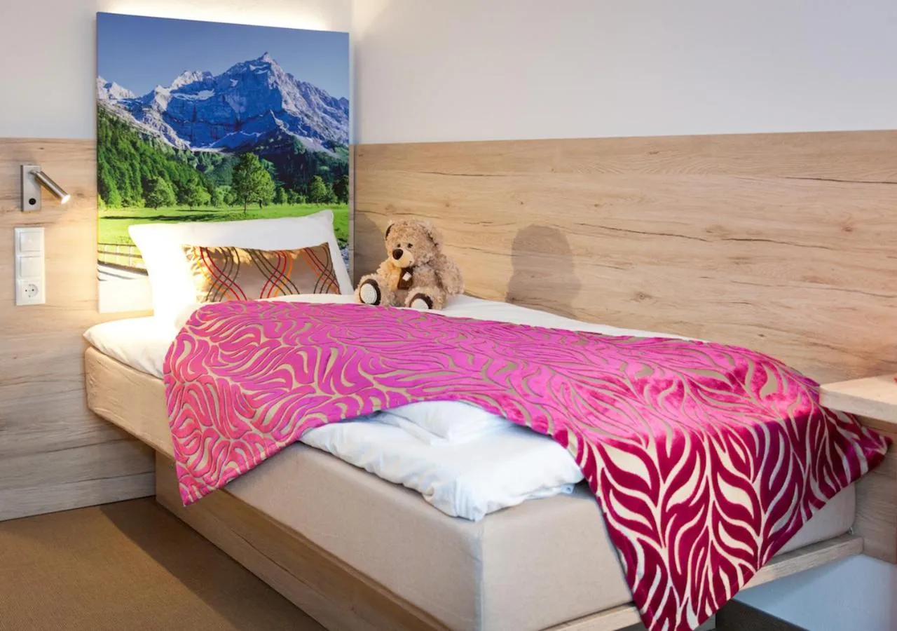 Decorative detail, Bed in Hotel Edel Weiss