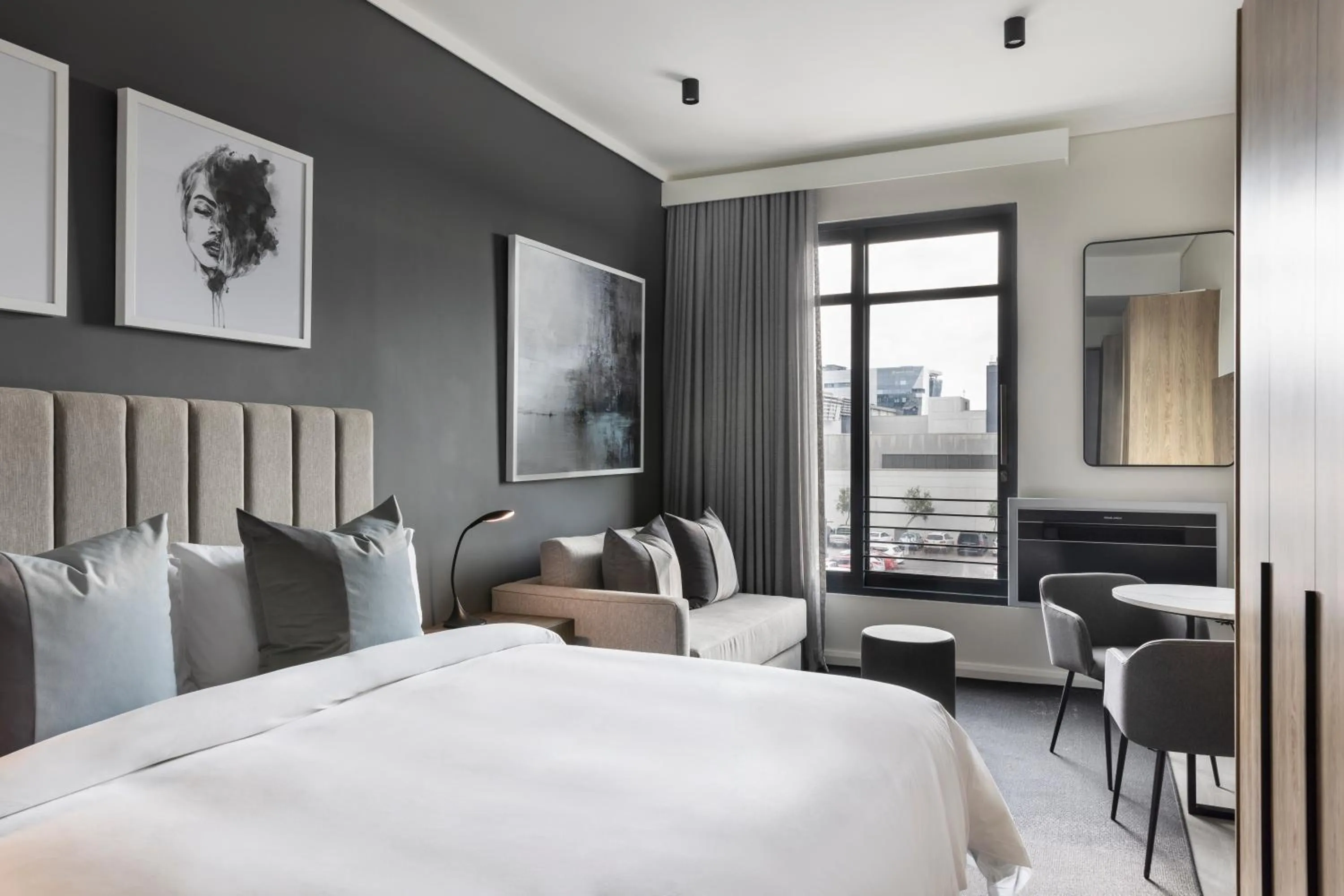 Photo of the whole room, Bed in The Capital Trilogy Menlyn Maine