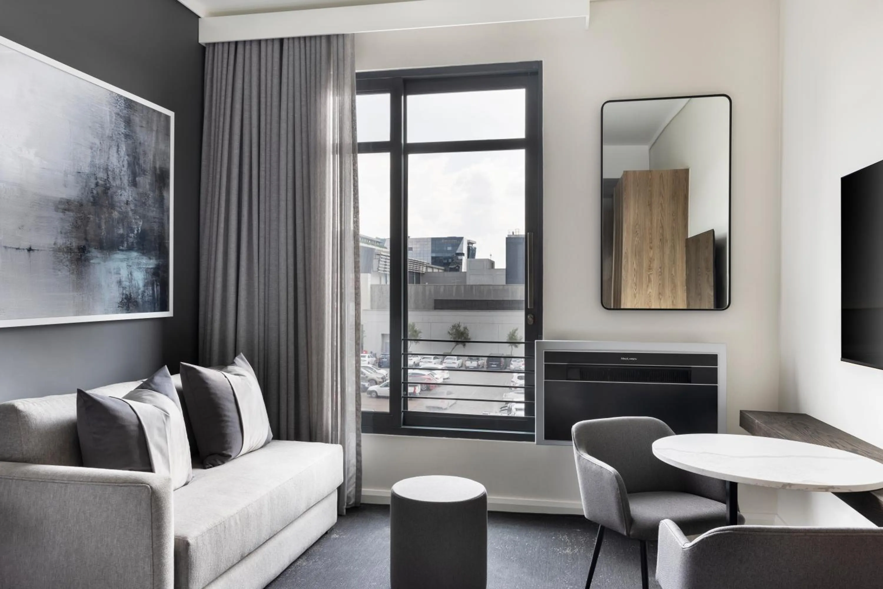 Living room in The Capital Trilogy Menlyn Maine