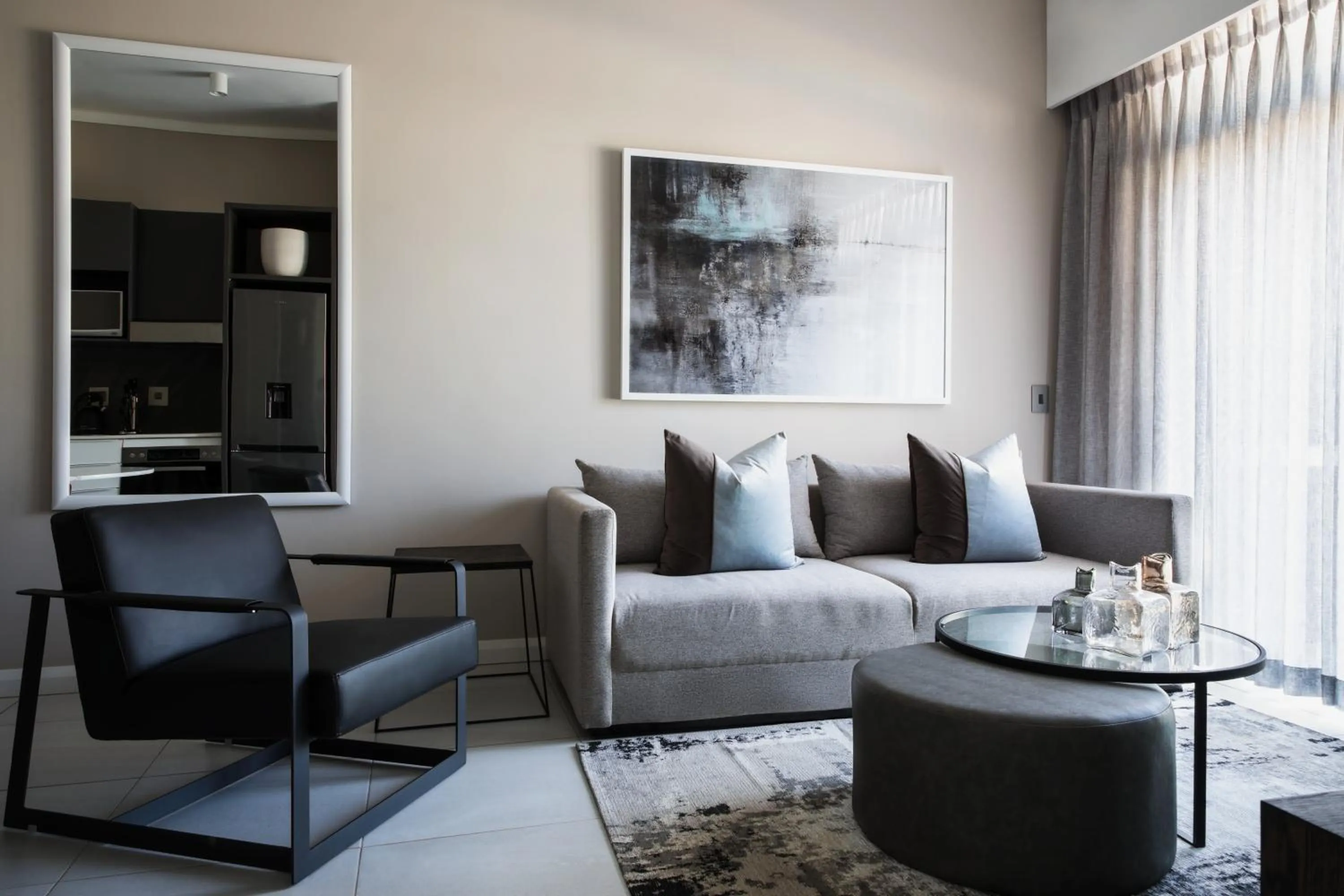 Seating area in The Capital Trilogy Menlyn Maine