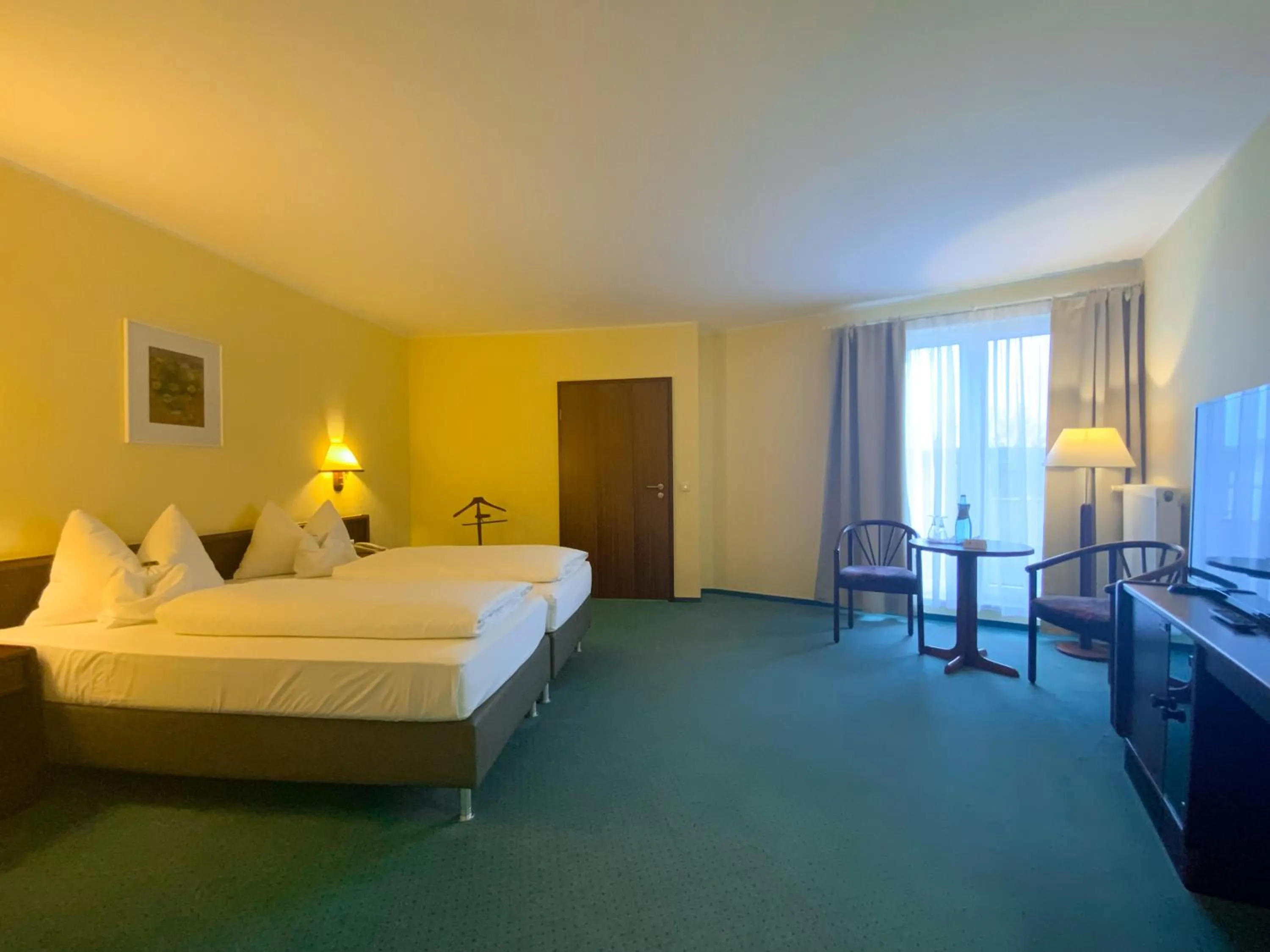 Bed in Heidehotel Lubast