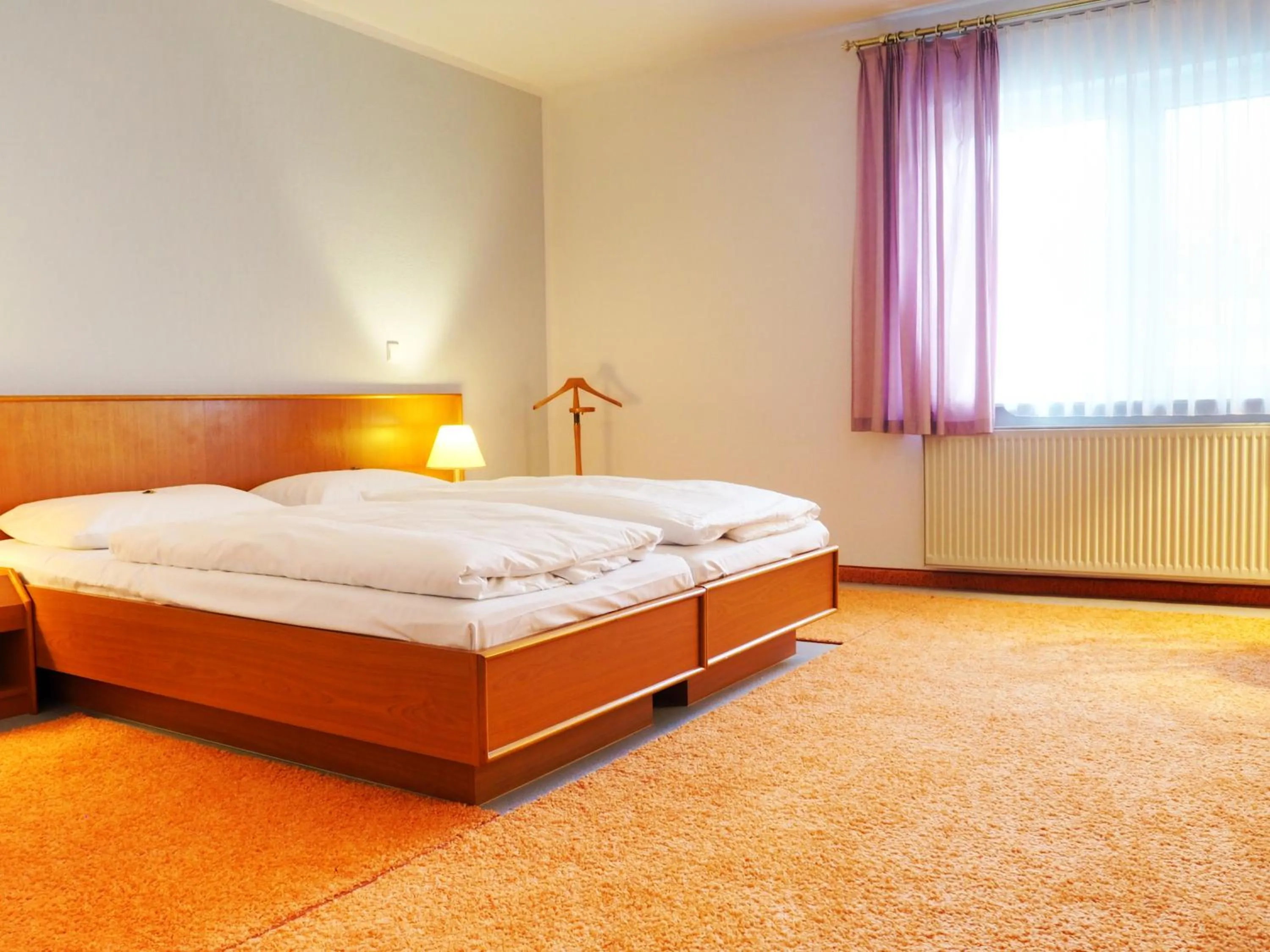 Bed in Heidehotel Lubast