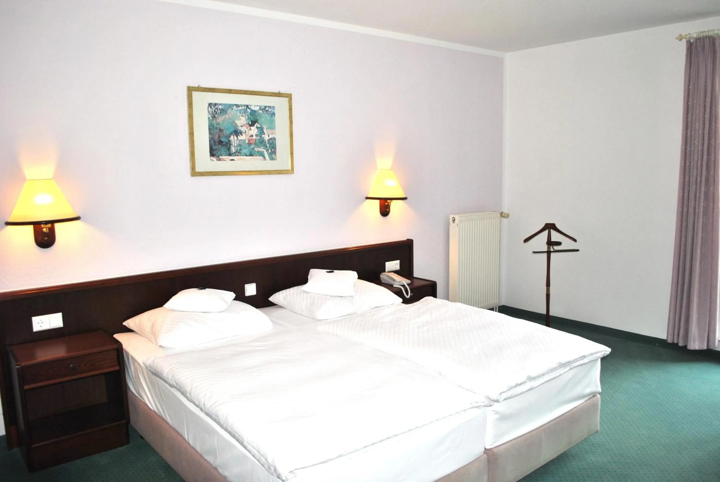 Bed in Heidehotel Lubast